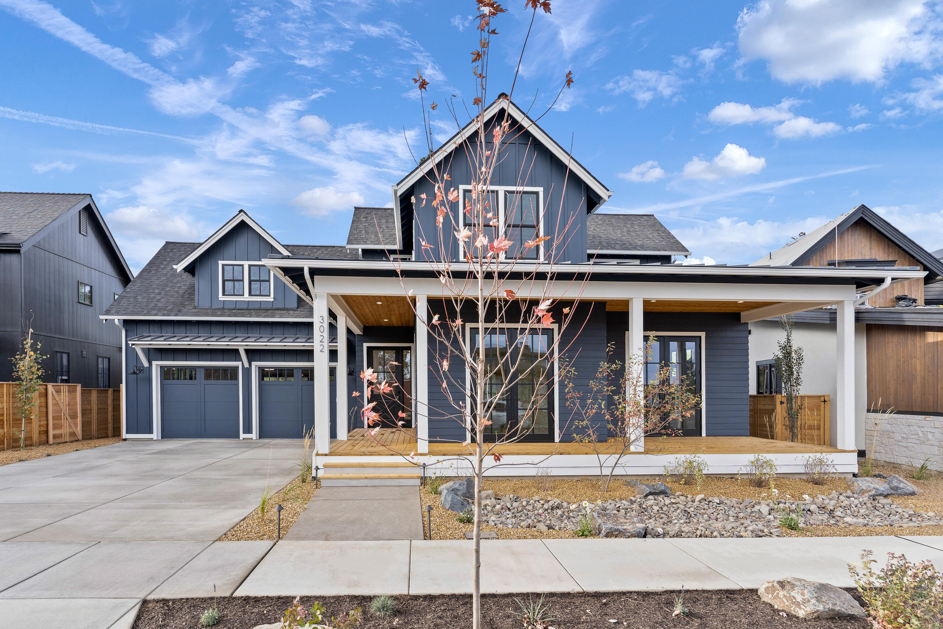 The home you've been waiting for! This exceptional new construction, custom modern farmhouse located in Bend's most desirable westside neighborhood has all the bells and whistles. This third of an acre lot looks out to unbuildable green space in the coveted Discovery West development. With the primary bedroom and spacious office on the main floor, this 3506 square foot gem features radiant heated hardwood floors throughout. This dream chef's kitchen boasts high-end stainless-steel appliances including a 4 ft. galley sink with interchangeable cutting board, drying racks and more. The 4-car tandem garage has a glass paned, full-size garage door that opens to the back yard and for Fido, a full dog washing station. The state-of-the-art heating and cooling system offers a whole house humidifier. No detail has been overlooked in this remarkable custom home. Call today for your private showing.