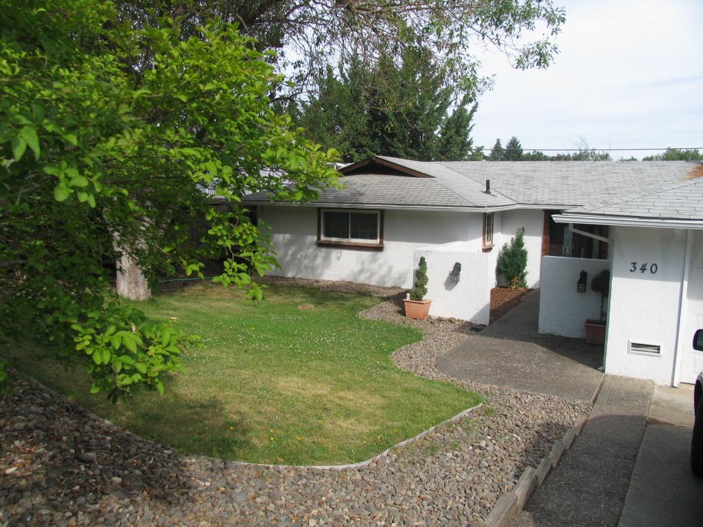 Cute starter home or good investment property. Located on a quiet street dead end street. This cutie has newer certified wood stove, newer HVAC system, paint inside and out. Granite in the kitchen, newer range/oven, laminate and tile flooring. The concrete walls keep the home cool in summer and warm in winter, mono slab foundation. This is priced to sell and being sold as it.
