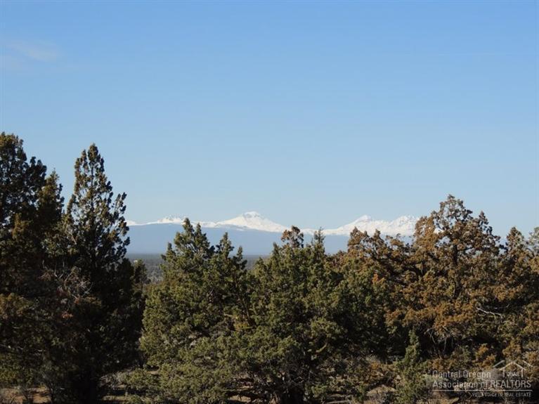 Gorgeous Golf Views on the 10th Fairway off the back of this Half Acre Homesite, Cascade Mt Views off the front, Old Growth Juniper and Quiet Cul-de-Sac. Enjoy all the Benefits of Membership, 18,000 SF Athletic Center, 3 Pools, Water Slide, Lazy River and State of the Art Work Out Facility. Brasada Canyons, 18 hole Private Golf Course, Spa Brasada, Equestrian Center, Restaurants, Hiking, Biking, Horse Back Riding and Much More!