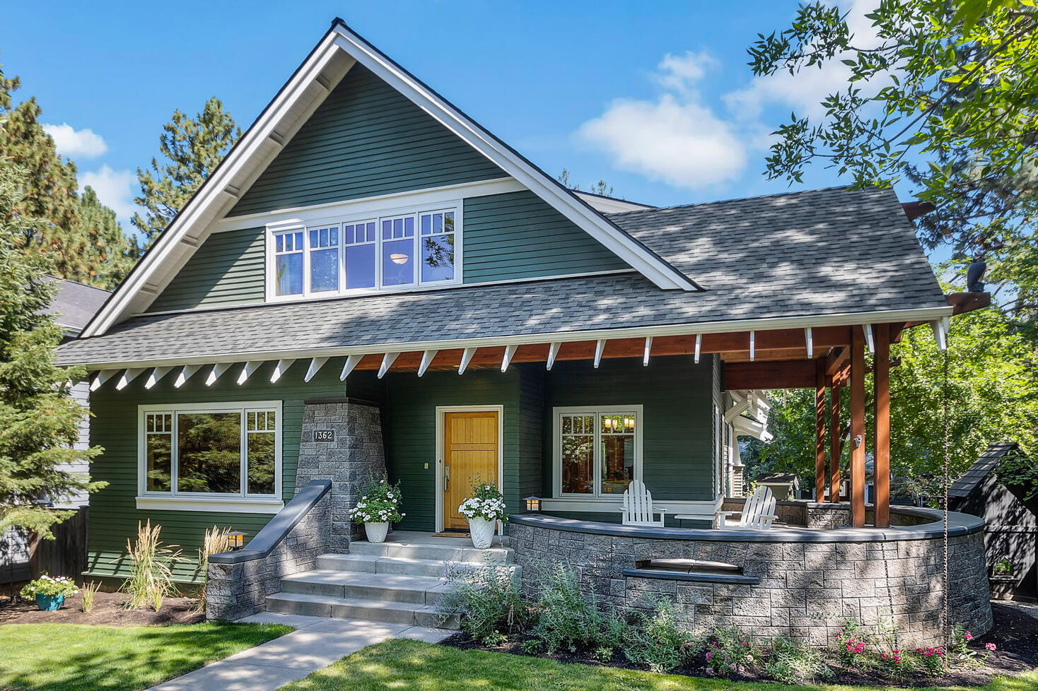 Welcome home! This first-time-on-market, 3866 sq. ft. Craftsman home in desirable Northwest Crossing offers 5 bedrooms, 4.5 baths, a media room with screen/projector, and a separate office/guest suite (accessible via the garage or its own entrance) that has a full bath, gas fireplace, and skylights. The main floor features 9-foot ceilings and Brazilian cherry hardwood throughout, while the master has a fully marble-tiled bathroom and walk-in closet. Upstairs are two spacious bedrooms with vaulted ceilings, cherry hardwood floors, four walk-in closets, a loft and a full bath with cast iron tub. The 1440 sq. ft. daylight basement has 10 ft. ceilings, laundry room, large food pantry, full bath, two bedrooms with walk-in closets, and brew/craft room with exterior access. Additional features: private yard, extra-large garage, detached single garage; new roof, interior and exterior paint, new water heater, and newer air conditioner. Make this beautiful house your home.