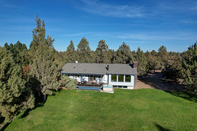 Come see this classic 4 bed 2346 sq ft home with a finished basement on 6.5 acres with great Cascade Mtn Views.  You will love this horse property with the freedom of no HOA or CCRS restrictions and low property taxes.  The home and property feature Wood beam ceilings, Hardwood floors, Food Panty, Multiple Pellet Stoves, Unique Master Suite, Wood Fireplace, Several Windows, A/C/Heat Pump, Extensive Covered Back Deck, Covered Front Porch, Fast Fiber Optics Broadband Internet Speed,  Massive Lined Pond, Spacious Back Lawn w/ Automatic Yard Sprinklers, Large Garage with Great Storage and Wired for 220 Volt uses air compressor or machine tools, Barn, Corral, Green House, RV/Boat Parking, RV Hook Up, Covered RV Awning, Your own Private Well with a New Well Pump and New Pressure Tank.  All located with an easy drive to Medical, Costco, Shopping and downtown Bend.  Call today to schedule your private showing tour and your opportunity to own a place you can call home.
