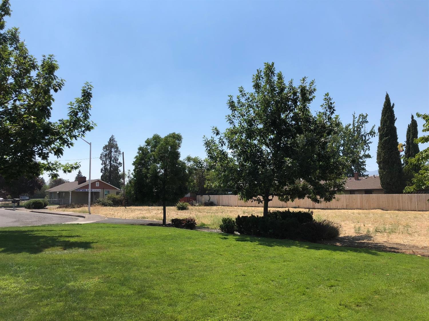 Fantastic .33 acre commercial building lot with high visibility at the entrance to Central Point, Oregon. Near the Albertson's Shopping Center with easy access to I-5 Exit 33. All services to the site. Planning approval for a professional office building available to qualified buyers. This is a one of a kind location with great visibility!