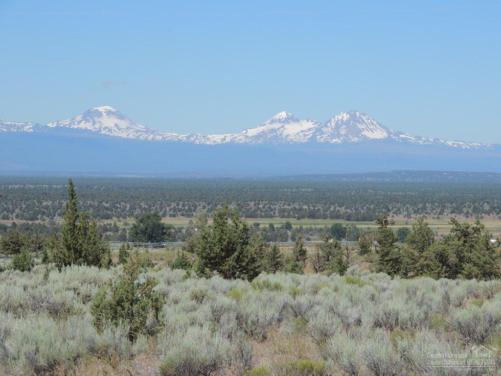 Gorgeous Half Acre Homesite, Panoramic Cascade Mountain Views across Large Common Space off the back and Powell Buttes off the front. Close to Walking Trails to the Amentities, Quiet Cul-de-Sac at the edge of Brasada Ranch, surrounded by common space. Enjoy all the Benefits of Membership, Athletic Center with Three Pools, Water Slide, Lazy River and Workout Facility, Spa Brasada, Sage Canyons 18 Hole Private Golf Course, Member Club Room, Equestrian Center, Restaurants, Hiking, Biking and Horseback Riding!