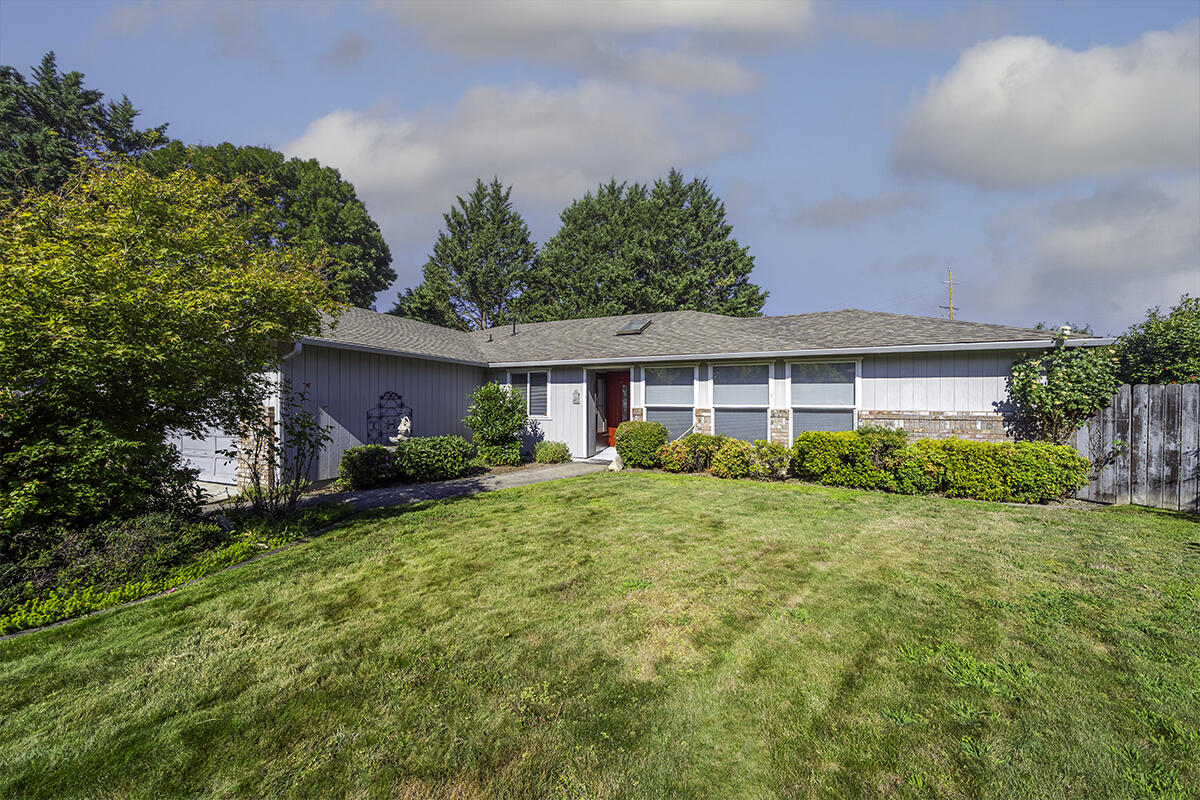 Welcome to this charming single-level home on a lovely E. Medford cul-de-sac. Built in 1989, this 1,576 sq ft, 3 bedroom, 2 bath home sits on a large .28-acre lot with a park-like setting. The spacious living room features large windows for natural light, and the kitchen offers ample cabinetry with a comfortable flow into the dining area. Enjoy outdoor living with a beautiful pergola, covered patio, and hot tub—perfect for relaxing or entertaining. An oversized attached garage plus an additional garage/workshop provide excellent space for storage or hobbies, and RV parking is an added bonus. Mature landscaping surrounds the property, creating a private retreat while still being conveniently close to shopping, schools, and parks.