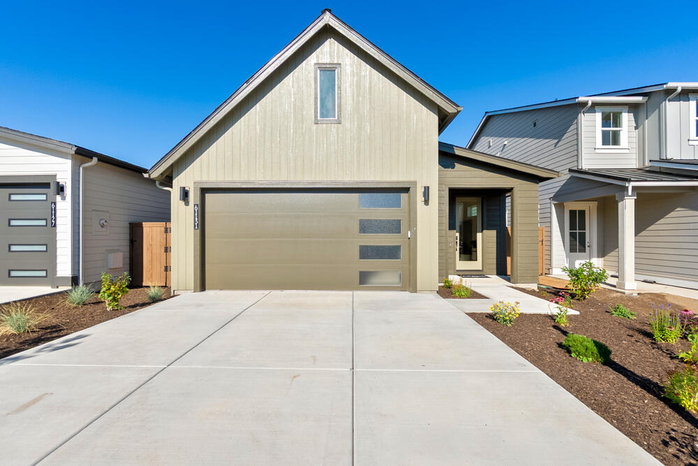 The STEEN on lot 7, built by award winning Pahlisch Homes, is complete and MOVE IN READY! A wonderful new plan offering a perfect blend of comfort, convenience, & style, making it ideal for those seeking a modern, low-maintenance lifestyle in a prime location. The layout ensures that every square foot is utilized effectively, creating a harmonious flow from one space to the next. The centerpiece of the home seamlessly integrates the living, dining, & kitchen, making it ideal for entertaining guests or spending quality time with family. 
Located on the desirable east side of town, this home is perfectly positioned for convenience & accessibility to Medical facilities, shopping, eateries, & Pine Nursery Park, a beloved community gem, just minutes away, offering a wide range of recreational opportunities.    Photos are virtually staged.