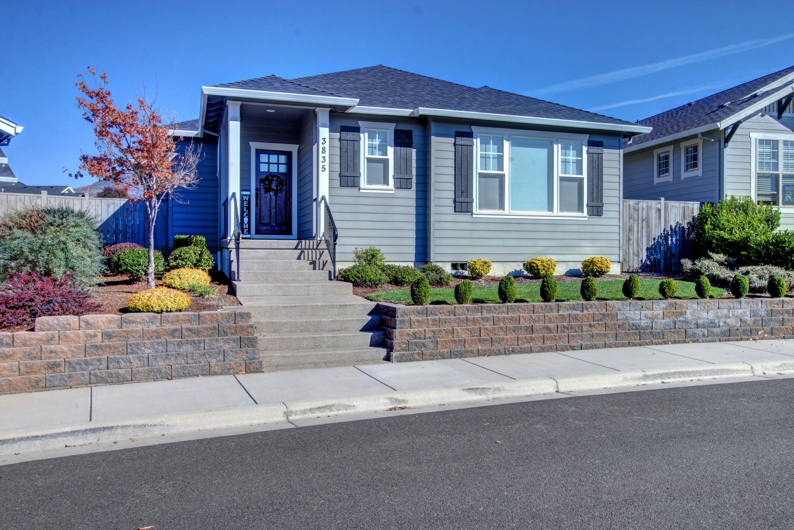 Beautiful home in the desirable Eastgate Subdivision now available! This home features 3 bedroom, 2 bath home, built in 2017 shows like new and is within minutes of shopping, schools & more.  Upon entering the home, you'll love the open floor plan, lots of tall windows,9' ceilings and natural light. This home offers a nice size kitchen, custom cabinetry with under mount lighting, island w/breakfast bar, granite counters with tile backsplash, Stainless Appliances & a large living room w/Gas fireplace with stone finishing. Master with en-suite bath with granite counters, tiled shower, dual sinks and walk in closet. Two nice size guest bedrooms and guest bath. Spacious dining room with slider leading to covered rear patio and enjoy the views that overlooks a private backyard. Finished, insulated & heated garage.