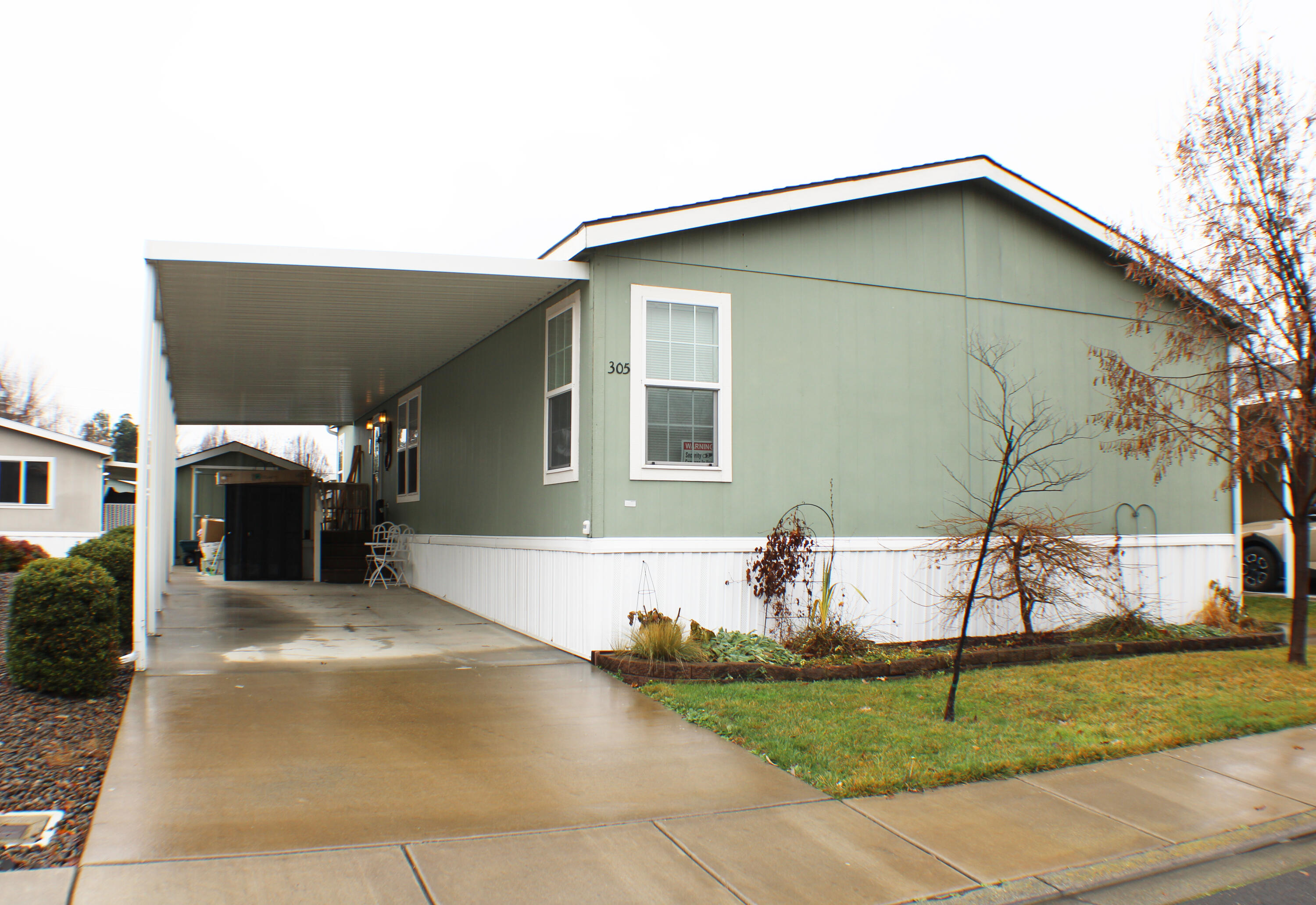 Look no further!! All Age Park!

This Light and bright Champion-built home in desirable San George Estates, an all-age community with mountain views. This inviting home features gorgeous custom leathered granite countertops, new flooring, a dedicated laundry room, pantry, and a well-designed kitchen with a breakfast bar and comfortable eating area. Additional highlights include a large shed, carport, low-maintenance yard, and sprinkler system. Community amenities offer resort-style living with an on-site pool, workout room, and a spacious community room available for private events. Up to two pets allowed. Conveniently located near parks, golf courses, and everyday amenities this home offers easy, low-maintenance living in a welcoming community.
