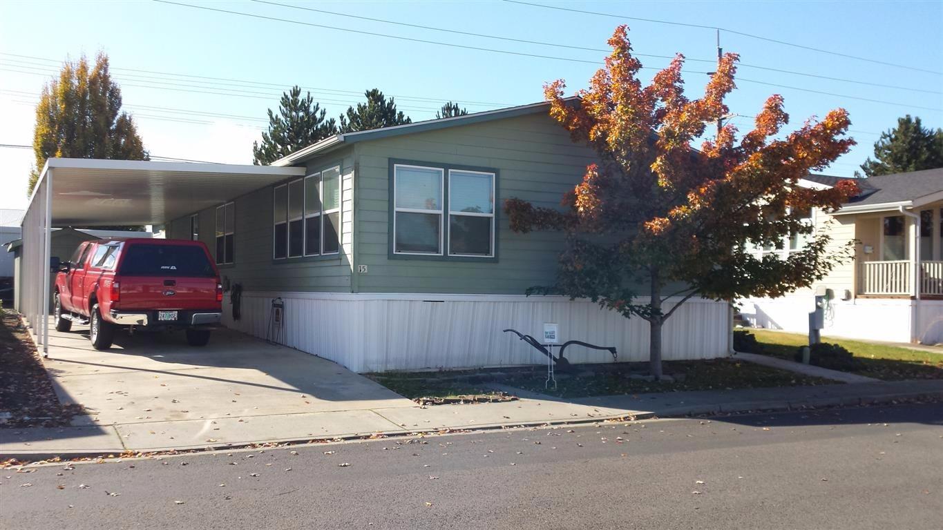 Nicely updated 3 bedroom, 2 bath home with 1795 sq.ft. Great split floor plan with separate living and family areas. All new in the last 2 years: granite countertops, vinyl flooring in kitchen, baths, entry and utility room, carpet, kitchen appliances, sink, faucet and window coverings. Large master bedroom with walk-in closet, bath with soaking tub, 2 sinks and a walk in shower. Vaulted ceilings throughout, ceilings fans. Easy care yard, storage shed with concrete floor. Park amenities include clubhouse, pool, exercise room, playground, billiards, and community activities. RV storage area and easy access to the Bear Creek Greenway for walking and biking. Space rent $575/mo.