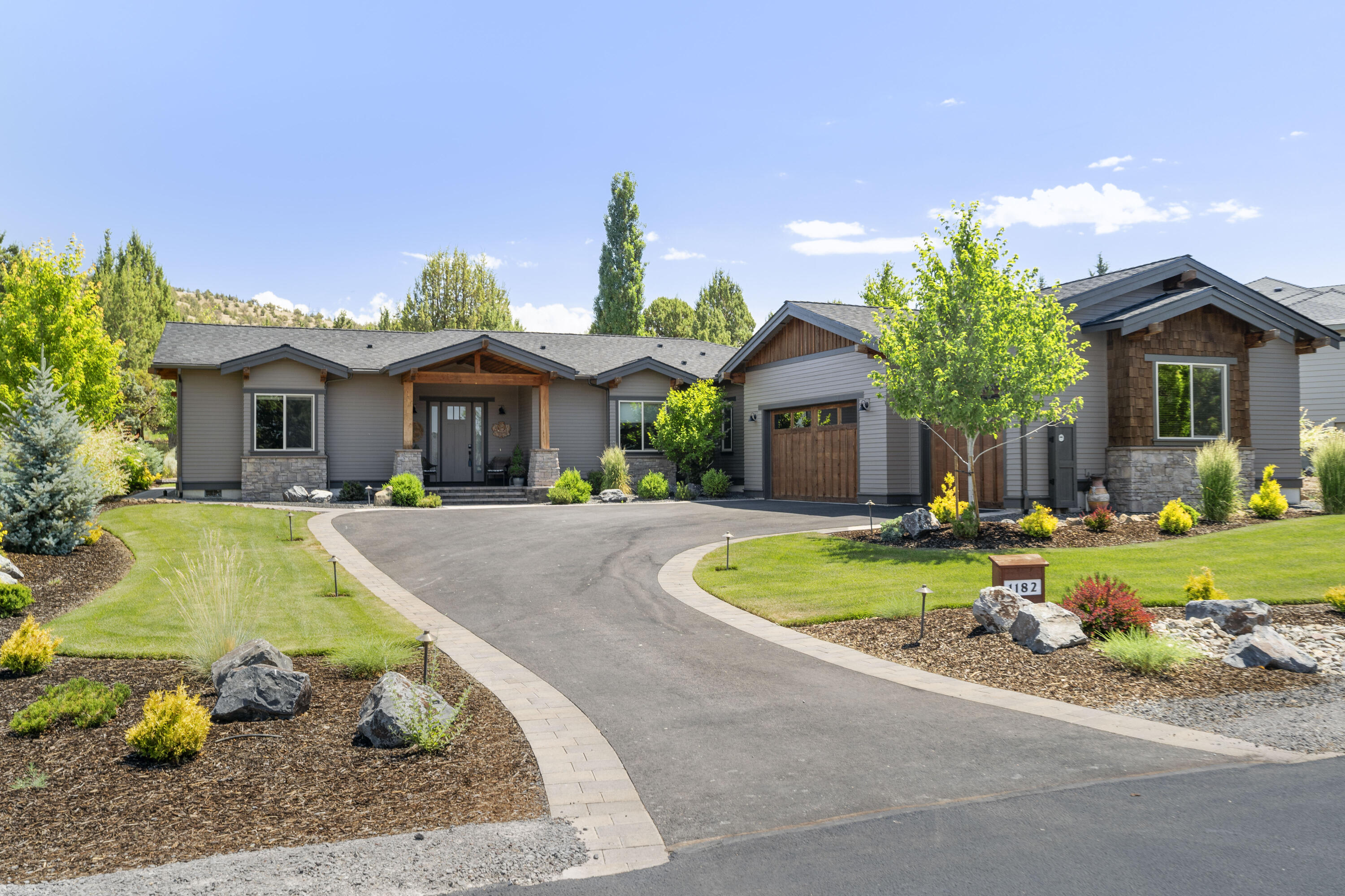 Located on the West Ridge in Eagle Crest Resort, this single-level custom home backs to Trail Creek, offering a peaceful setting and easy access to paved pathways and The Lakeside Sports Center. 

Step inside to discover three thoughtfully planned en suite bedrooms, including a luxurious  primary retreat. A dedicated office/4th bedroom space provides the perfect work-from-home environment, while a convenient half bath serves your guests. The home's interior showcases vaulted ceilings and beautiful hardwood floors throughout, creating an open, airy atmosphere.

The kitchen features stainless steel appliances, a gas range, quartz countertops, and a walk-in pantry. Multiple dining areas and a built-in buffet, sets the stage for memorable gatherings.

Step outside to your partially covered paver deck, where a soothing water feature creates the perfect backdrop for outdoor relaxation.

Car enthusiasts will appreciate the expansive 1,124-square-foot triple car garage.