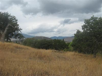 Rural Ashland Completely Irrigated! Substantial price reduction on this 5.97 acre homesite, Septic Approval, Great Views of the Surrounding Mts., only 3 miles from town. Rolling and Level with TID ponds. The best part is the price, owner to drill well and possible owner carry terms. $199,000