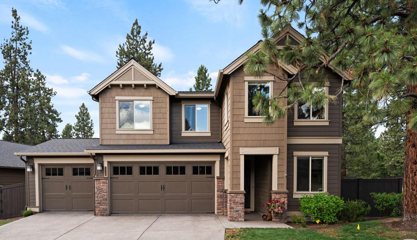 Price Improvement! Meticulously maintained 5-bedroom, 2.5-bath home by Pahlisch, located on a large corner lot in Bend's sought-after Stonegate neighborhood. This 2,771 sq ft home offers the perfect blend of luxury and comfort. Inside, you'll find a thoughtfully designed layout with new engineered hardwood floors, plush carpeting, and upscale finishes throughout. The main level features a gourmet kitchen with stainless steel appliances, ample cabinetry, a large island, and flows seamlessly into the open-concept living room with built-ins and a gas fireplace as well as a dedicated office/flex space. Upstairs offers 4 generous bedrooms plus a large versatile bonus room with a closet-ideal as a 5th bedroom or media room. The oversized three-car garage boasts abundant storage for vehicles and gear. A beautifully landscaped back yard provides outdoor living on the covered patio overlooking peaceful green space. HOA amenities include front yard landscaping, pool, clubhouse and scenic trails