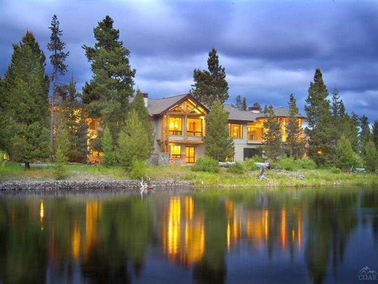 Privately tucked between the Crosswater golf course and 400 feet of the Big Deschutes River lies one of the most extraordinary estates in Central Oregon. Behind the mahogany gate lies a manicured 2.8 acre lot and a 7,991 sq. ft. estate home. A log-truss portico and basalt fountain welcome you into the home featuring 4 bedrooms, 5.5 bathrooms, indoor lap pool, rec. room, covered decks overlooking the river, and 7-car garage. Lot also is home to an 800 Sq Ft accessory building & private boat dock.