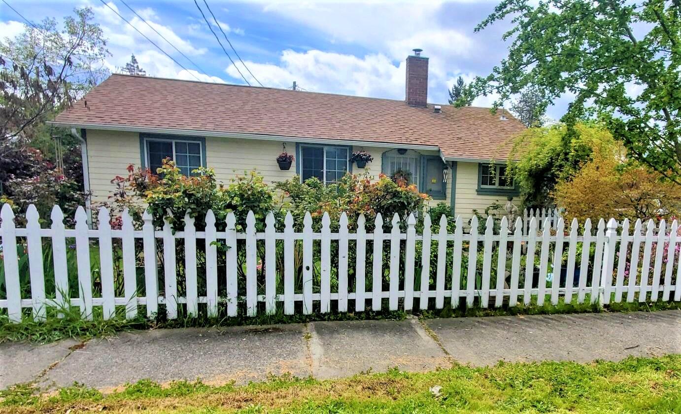 1,116 sq foot cottage in SW Grants Pass offers the charm of the 40's and has been added onto over the years.  Statement fireplace with wood stove as additional heating source in living room, galley kitchen has tile countertops, tile floors and double ovens.  Primary bedroom has laminate floors, mini split heating/ac unit and shared bathroom with an additional room that can be used as an office - this additional space does not have a window so cannot be counted as a bedroom.  Second bedroom has an ensuite half bath.   Mix of vinyl windows and original single pane wood windows.  This .15 acre lot has multiple fruit trees; persimmon, apple, peach and cherry trees.Enjoy the mature perennial flowers and landscaping while relaxing under the included gazebo in the backyard. **Professional Photos to come!**