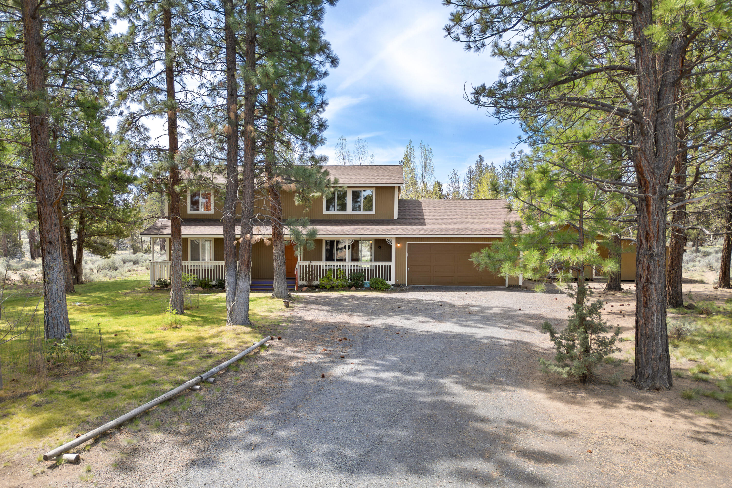 Welcome to this beautifully maintained, original-owner home nestled in the highly sought-after Sundance East subdivision. situated on a prime 3.47-acre lot that backs directly to the National Forest. This property offers a rare blend of seclusion, scenery, and serenity—perfect for nature lovers and outdoor enthusiasts alike.

A spacious covered front porch invites you to sit back, unwind, and take in the breathtaking views that surround you. Inside, the 3-bedroom, 2.5-bath home with bonus room features a thoughtful, functional layout with Large windows throughout frame stunning views while bringing in abundant natural light.

Recent updates include a newer roof, updated living room acacia wood flooring, and a brand-new mini-split HVAC system for year-round comfort. The oversized, deep two-car attached garage offers plenty of space for vehicles and gear, while the detached woodshop is perfect for hobbies, storage, or additional workspace. 

Seller is offering a $5K paint credit.