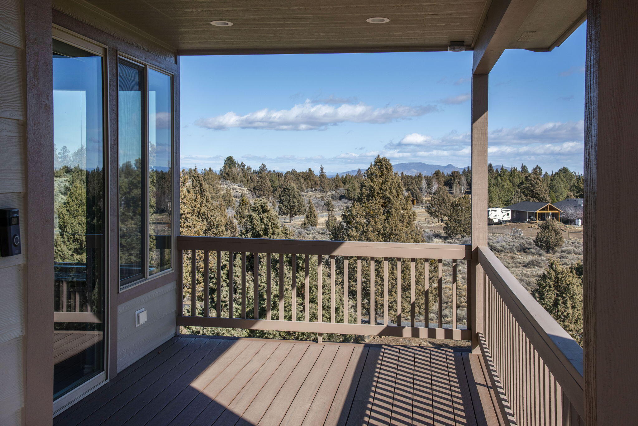 Panoramic Cascade Views! This is a rare opportunity to own 6.2 acres in Bend's prestigious Golden Triangle—where privacy, luxury & panoramic vistas converge. A striking 3,272 sq. ft. home—mostly single lvl—has been thoughtfully updated to elevate both form & function. The brand-new prmry ste stuns w/ sweeping 7-peak Cascade views, while the soaring new living room features vaulted ceilings, more views, a refined fireplace, and wall-to-wall windows framing Eastern mountains  & the preserved Greenlee Nature Preserve across the road. Upgrades include wide-plank engineered hardwood w/ radiant floor heat, a sleek slab granite kitchen & a cozy family room w/ its own fireplace. The main lvl offers 2 bdrms + an office (or 4th bdrm), while an upper-lvl ensuite w/ loft adds the perfect flex space.
Enjoy low-maintenance living w/ Trex decking, a chipping green, fully paved drive, a 44-panel owned solar system, oversized 3-car grg + shed.  ADU potential! This property is in immaculate condition!