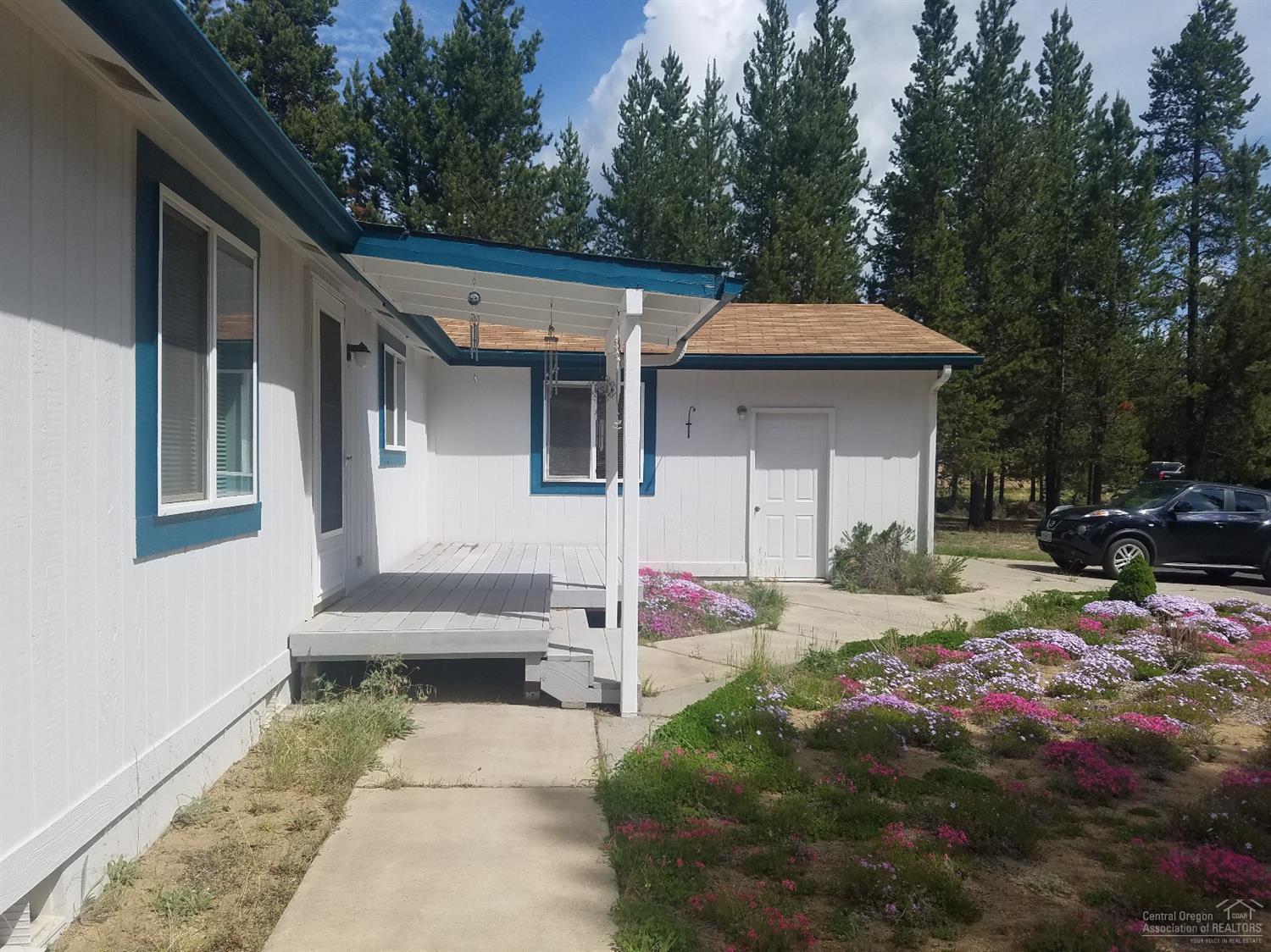 You will love how this home sits towards the end of the street. Lots of windows give you great natural light throughout the home. Spacious 3 bedroom home has sitting room off the master bedroom could be a 4th bedroom, office or nursery. All closets are walk ins, separate laundry room with washer and dryer included. Attached garage is a huge plus - heat pump gives lower heating bills and cooling during summer. Trex type decking front and back. French doors off the dining area lead to the back deck and yard.