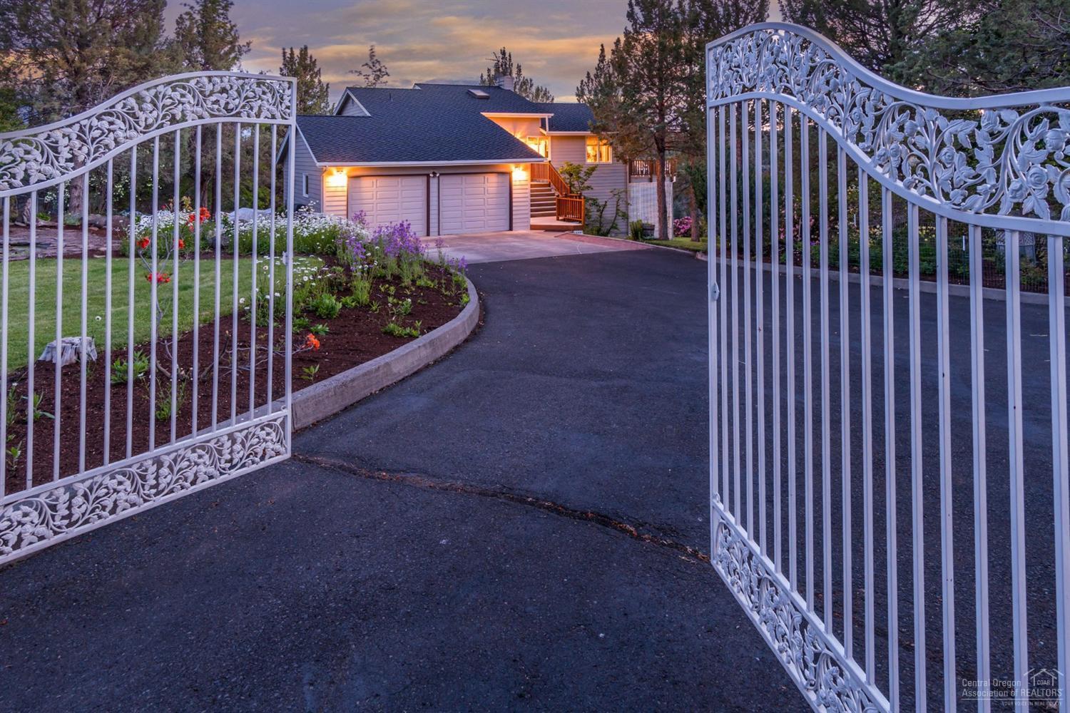 Beautiful River Estate-w/Mtn views. Great location close in.Two Ponds w/water lillies,small Waterfall, Partially fenced. Vaulted Ceilings in LivRm and Dining Rm.Nice Breakfast Nook, 2 Solariums,Large Master Bath w/bidet,,jetted tub for 2, Porclain tile,Kohler fixtures. Master Bedrm w/walk-in closet. Nice Utility Rm.Small wine Rm.Wood Windows,2 Sky Lights,Beautiful Trees&flowers.Trial to River.Appx 585' river front.One Owner Home.