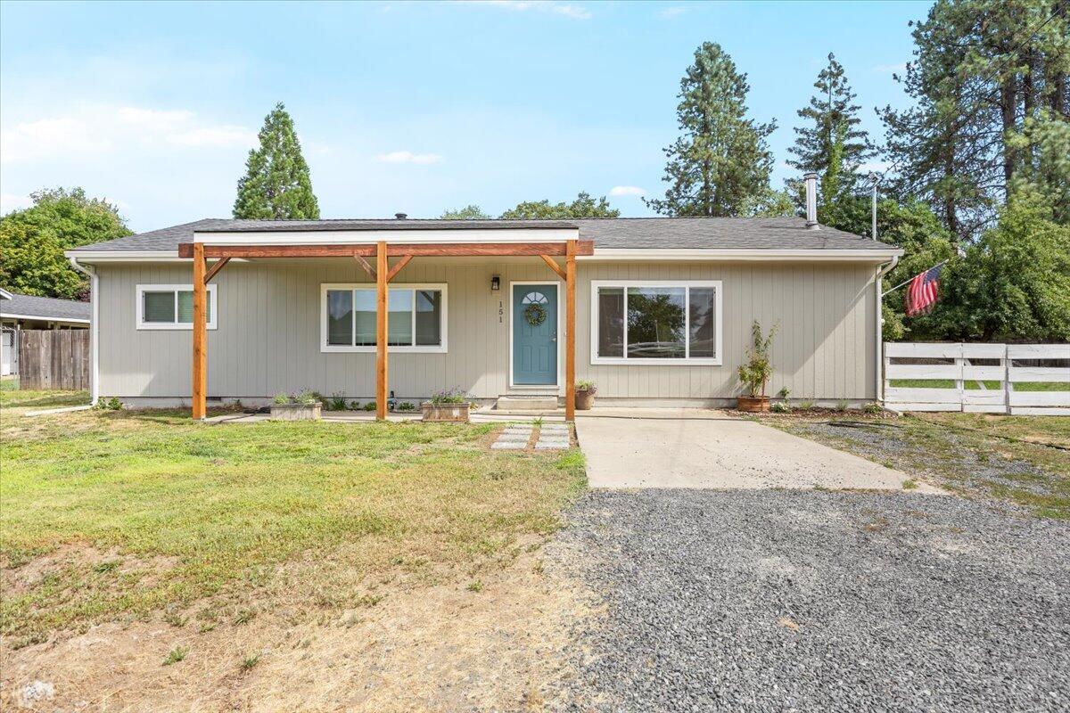 Step into this beautiful newly updated, move-in ready 3 bedroom 2 bathroom home, nicely situated on a peaceful .36 acre parcel! This home offers an intelligently utilized 1537 sq. ft. giving it tons of space! It showcases a new roof; new siding; new exterior/interior paint throughout; new cabinets, new mini-split, new windows giving an abundance of natural lighting and so much more! The kitchen has been completely revamped from head to toe! The expansive outdoor space has a fenced backyard and plenty of room for a possible ADU. Discover the allure of your own orchard right at home with 2 flourishing Apple  trees! Grape vines are along the back fence and gate, which provides access for RV or large vehicle parking behind the house. Come take a look before it's gone!