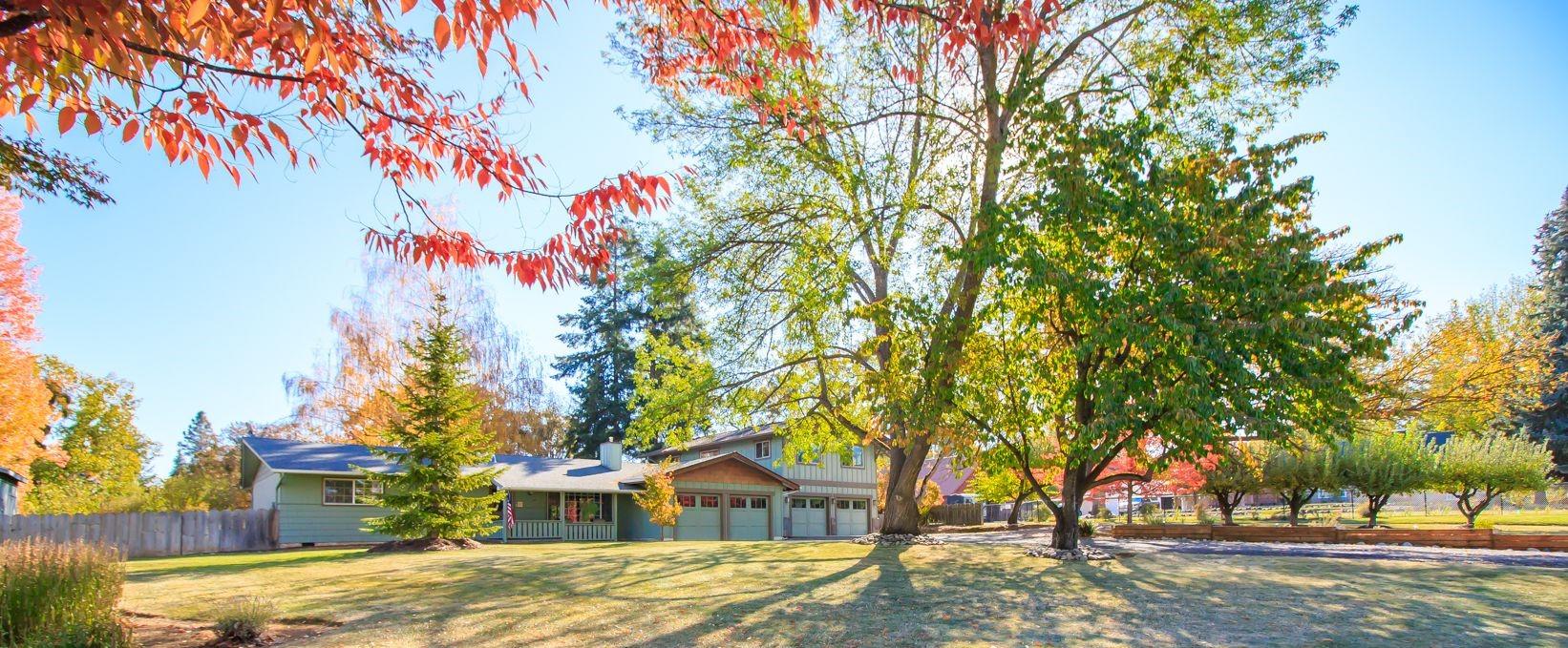Beautiful rural setting between Medford & Phoenix, convenient to everything. Magnificent mountain views. Landscaped oversized lot w/garden, fruit trees and room for a pool. Home updated w/beautiful custom features. Kitchen has cherrywood shaker cabinets, granite counters, farmhouse sink, double convection oven, breakfast bar. Peaceful living room w/gas fireplace, cherrywood mantel, pebblestone, tile hearth.  3 bedrooms on main level, one w/ensuite bath has tiled shower, vanity, heated floor w/pebblestone accents. The hall bath also has heated floors, soaking tub. One bedroom/office/workout room is on opposite side of home. Upstairs is an amazing huge primary bedroom suite w/stunning mountain views from every window, library, walk-in closet w/built-in cherrywood drawers, bath w/dual sinks, soaking tub, heated floors, dual heads in shower. Tiled, covered patio. 2 attached double garages. RV/boat parking. Room to work, learn and play from home.