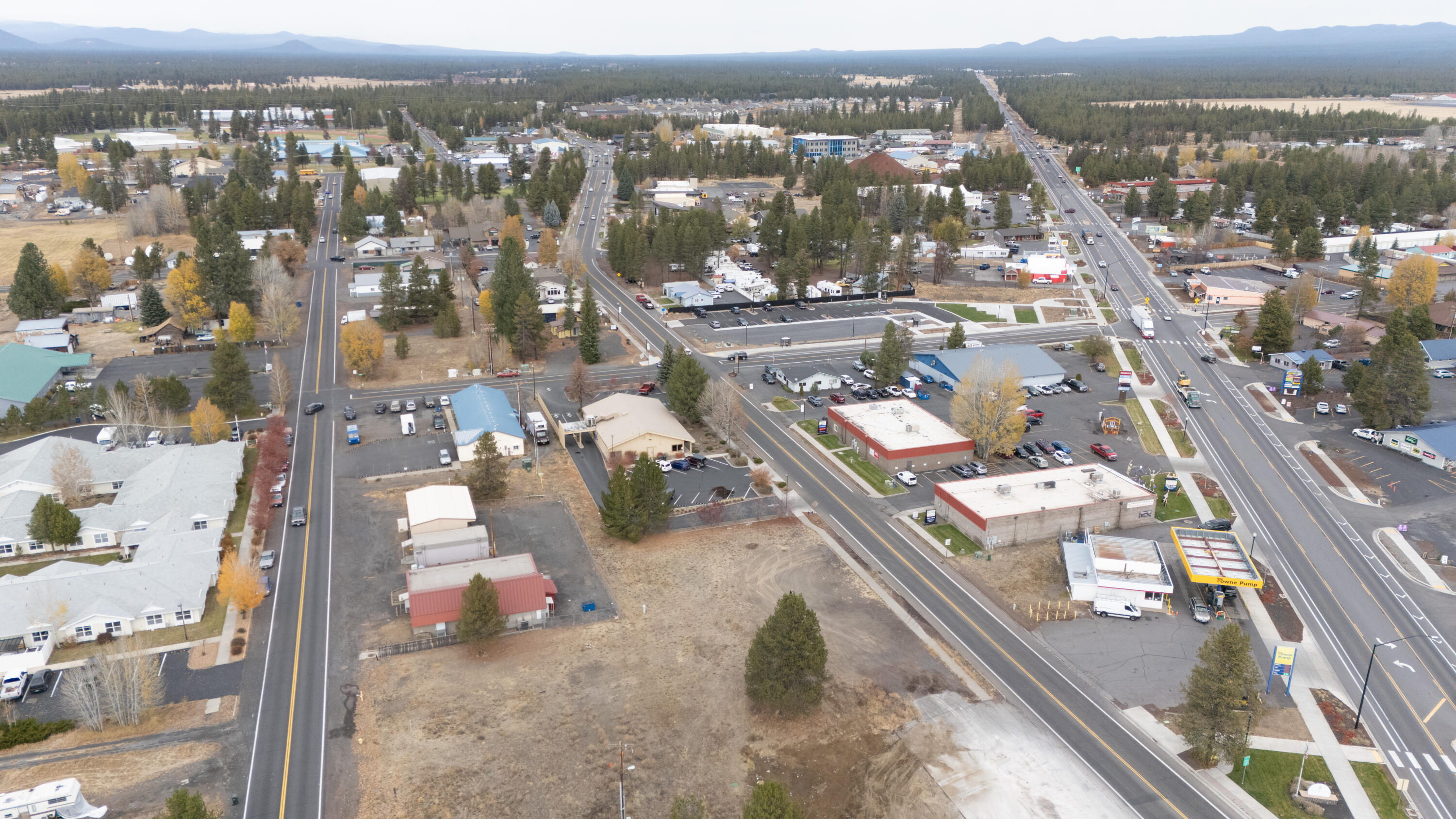 Attention all investors! Take a look at this .29-acre commercial property, perfect for your next development project. Located in a prime spot right next to US Bank, this property is situated in the walkable downtown area, close to the La Pine Bus Station. With La Pine's growth, now is an excellent time to consider building here!
This site is near the downtown hub, surrounded by restaurants, La Pine post office, shopping, offices, banks, and much more. It offers easy access to Highway 97. The property comes with approved structural engineering drawings for a 2-unit office building, totaling 2,520 square feet. It has been surveyed, and boundary markers are present.
Please note that the buyer is responsible for conducting all due diligence with the City of La Pine regarding any future development plans. Don't miss this opportunity!
''The sellers are the listing agents and licensed in the State of Oregon''