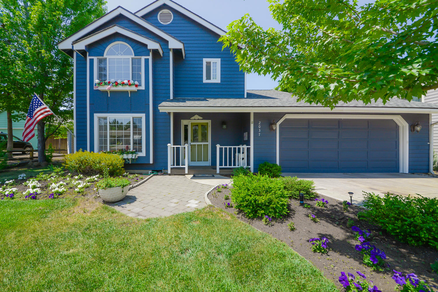 You don't want to miss out on this stunning 3 bedroom 2.5 bath home featuring an open floor plan, gorgeous oak floors on the lower level, and a beautiful secluded yard that backs up to a 2-acre parcel. This rare find is nestled in a private cul-de-sac in Bluebird Estates in the heart of Midtown. Newer roof and the interior/exterior has been freshly painted. There is plenty of storage between the double car garage and shed with a large deck surrounded by mature trees out back for entertaining. Property is close to several parks, schools, and shopping with a view of Pilot Butte.