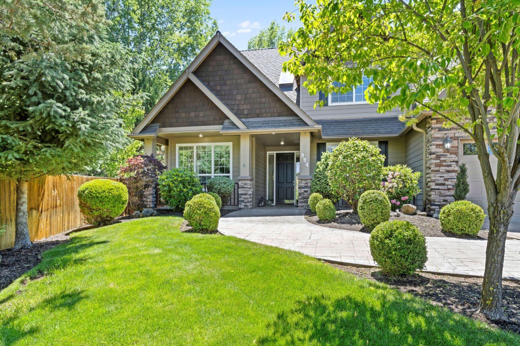 An upscale area of Tanglewood with sizzling curb appeal. Located at the end of a quiet cul-de-sac on a secluded .28 of an acre. Beautifully refinished white oak hardwood floors, gas fireplace, cherrywood mantle and built in shelving. Kitchen features newly refinished cherrywood cabinets, granite counters/backsplash, tile flooring, pantry, bay window, eating area & large breakfast bar. Large main level primary bedroom, walk in closet, refinished dual vanity, jetted tub, tile flooring & triple sliding glass doors out to the back deck. 2 bedrooms, 1 bath upstairs with a separate flex/loft area. Spacious 8' x 39' concrete RV parking area with double gates. Back yard has a private & tranquil setting, 15' x 35' Trex deck, fully fenced, hot tub & 8' x 8' garden shed. Meticulously landscaped, expansive paver stone driveway, Hardi-plank siding, covered front porch & stamped concrete walkway. Spacious 4 car heated garage w/1 tandem bay, 220V outlet & storage area above. There is no HOA.