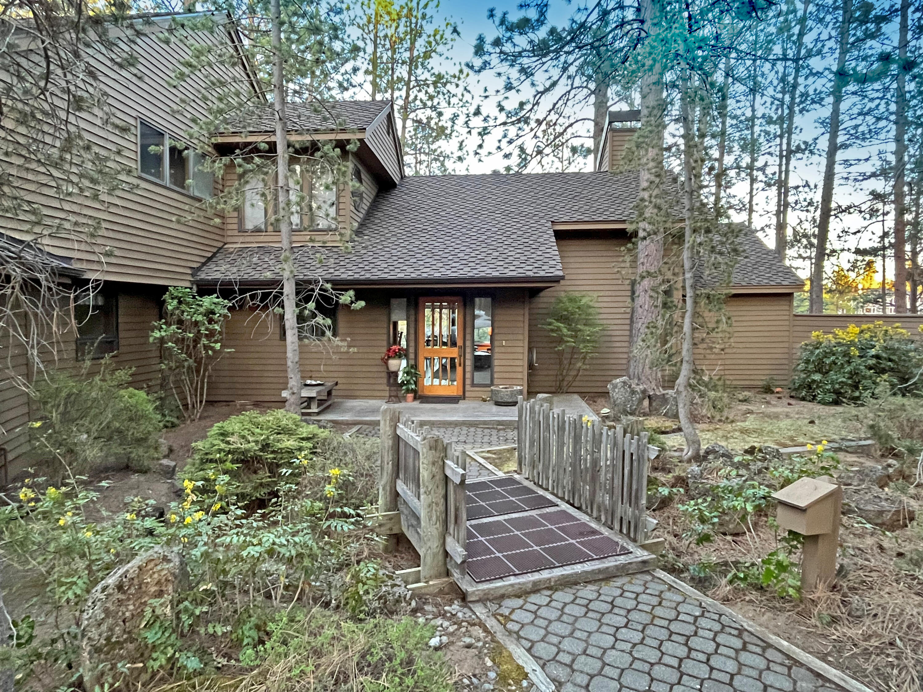 A THIRD BEDROOM on main level w/closet, egress to private outdoor area,  was originally an art studio. Custom architecture, great for entertaining. Cliffside homes on the Deschutes River don't come available often. Appraised at $1.675, 000. Only minutes from recreation, dining & services.  Stunning Deschutes River Canyon views from a high cliff offering tranquility among the whispers of fresh breezes wafting through the pines and the soothing sounds of the river's whitewater rush. Let your worries dissolve as you come home to the rustic, camp-like feel of this highly coveted neighborhood. Watch for the excitement & oneness with nature when spotting ospreys, eagles, deer & the diversity of wildlife. Entertain guests in the large open living spaces & large deck. A short walk  to the river trail. New high efficiency Furnace installed 6/16/25. Community Pool, Tennis, Clubhouse. Fridge, Washer & Dryer are included. Granite counters in Kitchen. Home is not for rent.