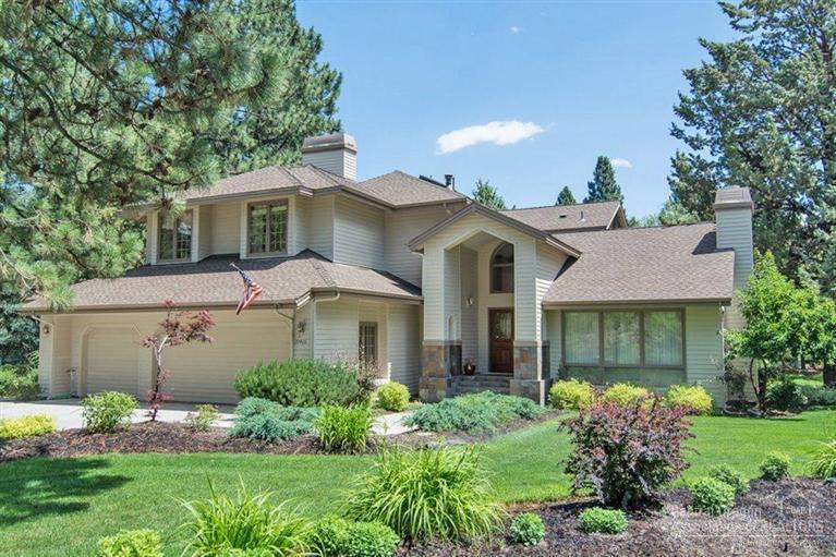 Located on the end of a private cul-de-sac, this home spreads onto two beautifully landscaped lots. Double entry door, two-story vaulted ceiling, formal dining with back patio access, three fireplaces, gourmet kitchen with stainless appliances, master suite with sitting room, his/hers walk-in closets, luxurious bath, walk-in shower. Wet bar adjoins family room and breakfast nook. Beautifully landscaped, mature trees, large deck backyard gazebo. Triple car garage with custom cabinets and work bench.