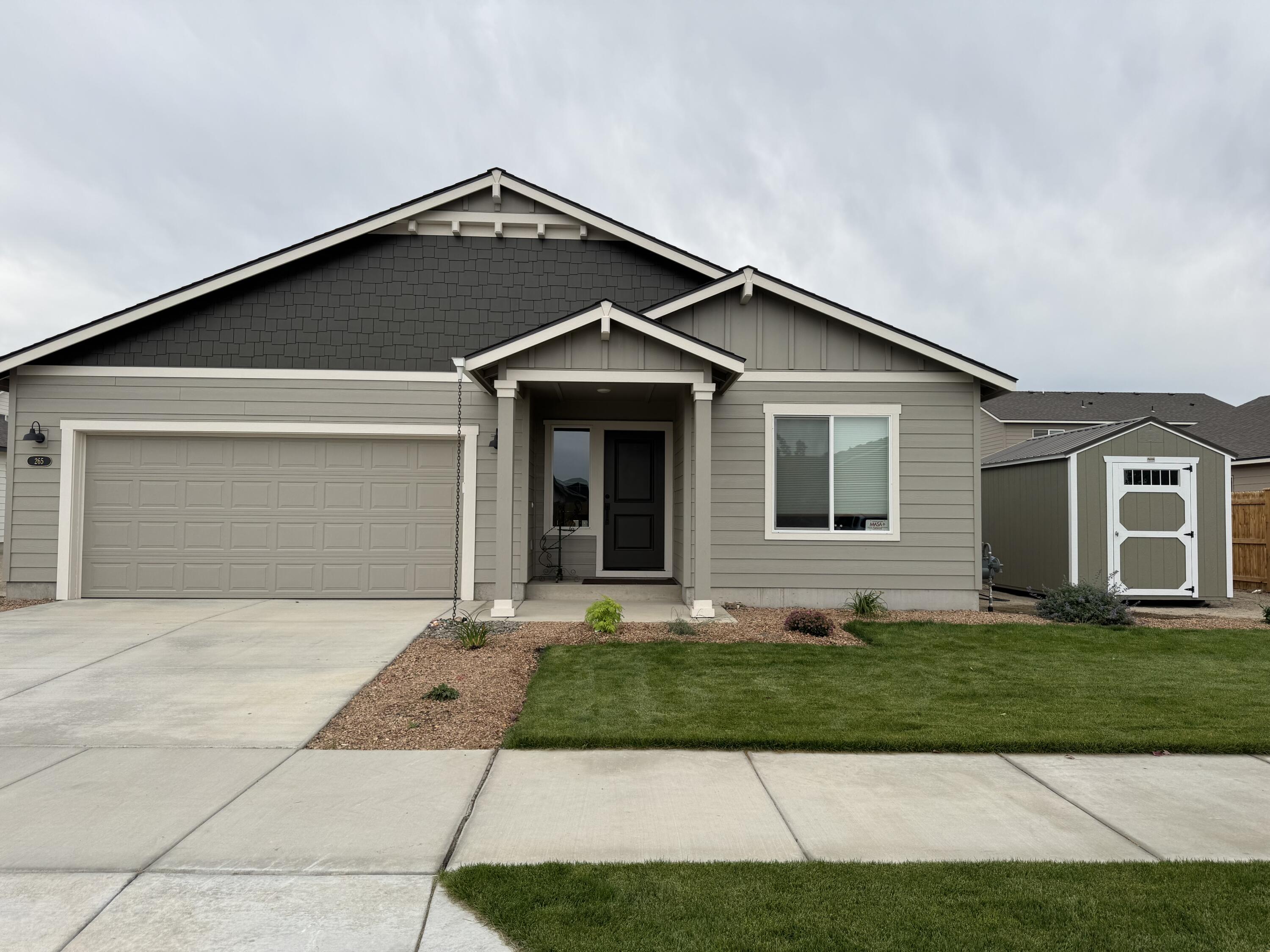 Motivated Seller's!! This beautiful 3 bedroom 2 bathroom 1,553 square foot home has only been lived in a few months!!! It has an open floor plan. Living room has a gas fireplace and vaulted ceilings, Kitchen and bathrooms have quartz countertops. All brand new appliances! Including: refrigerator, gas stove, dishwasher,  A/C, and microwave. Large master bathroom with two sinks, walk in shower,  large linen closet, and toilet room. Master bedroom is good size, has large walk in closet, and lots of light. Nice covered back porch. Front yard is in with sprinkler system. A nice size side and backyard you can make your own! A brand new storage shed as well!! Don't hesitate!! Call your favorite Realtor today!!