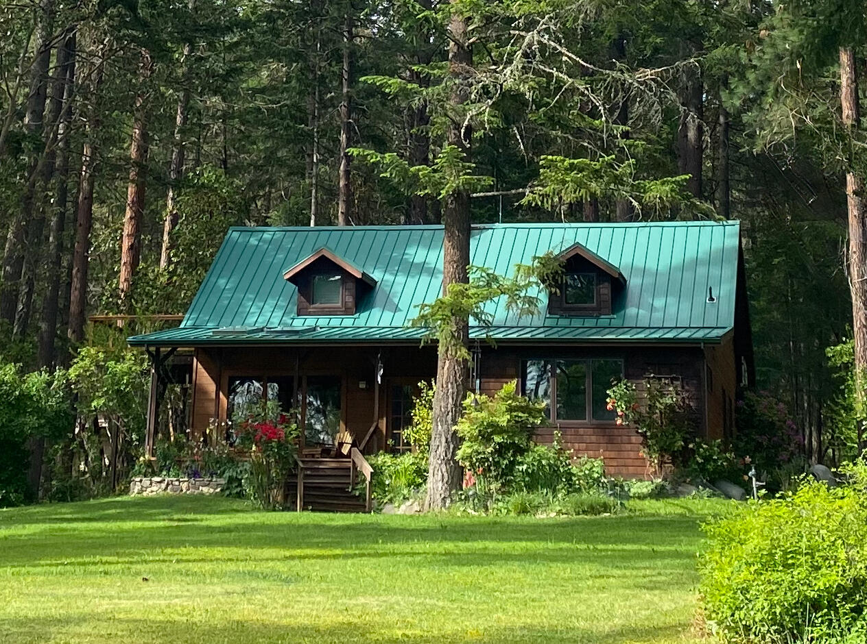 Enjoy the Applegate Valley on this pristine 22.47 acres. This wonderful property is truly a modern day homestead with organic gardens, irrigation rights and end of the road privacy. The lovingly crafted home has artistic details throughout with salvaged historic doors & custom cabinetry. The open floor plan has kitchen appointed with Viking stove, Jenn Air fridge, granite countertops & custom hardwood cherry cabinets. Auxiliary buildings include a garage/shop with second story guest quarters (complete with outdoor shower), detached carport, wood shed & chicken coops! Grow your own food with the fenced organic garden complete with raspberry patch, greenhouse & fruit trees, fertile pasture & two ponds!  The property is nestled down a private lane where you pass by beautiful homes and vineyards to enter the property lined with giant welcoming trees and flowering shrubs.  Enjoy nearby hiking and riding trails in the Applegate Wine Region on this special & ideally located property!