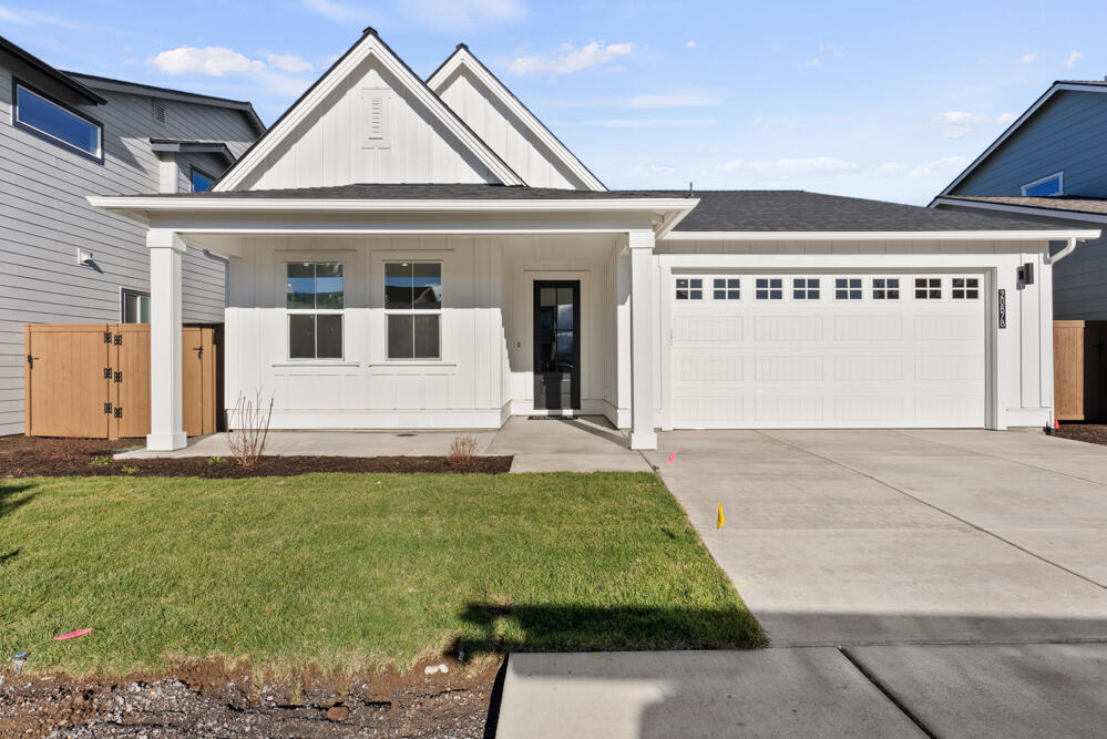 Easton Phase 2 - Homesite #180 - MOVE IN READY!! - Discover the popular Rainier floorplan, on Lot 180  in Bend's sought-after Easton community! This 2,122 sq ft single-level home features 4 bedrooms and 3 bathrooms, offering spacious, open-concept living. Enjoy quartz countertops, luxury vinyl plank, soft-close cabinets, backyard landscaping, fencing, mudroom and much more!  The extra large great room is perfect for entertaining. Modern comforts include A/C, a tankless water heater, full fencing, backyard landscaping, blinds and refrigerator.. Located in SE Bend, Easton offers swimming pools, parks, and walkable streets designed for Bend's sunny lifestyle. Photos are of actual home virtually staged.