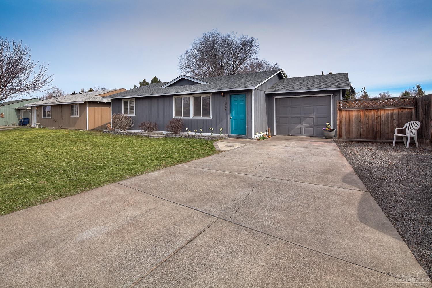 Fantastic Updated Single Level Living! Brand New Roof, New High-End Laminate Wood Floors, SS Appliances, Granite Counters, Vaulted Ceiling, Bonus/Sunroom with Tons of Natural Light. 180 Sq Foot Studio/Hobby Space w/ Electric & Heat, All Situated on an Over-Sized Lot. Seller Motivated! Bring All Offers!