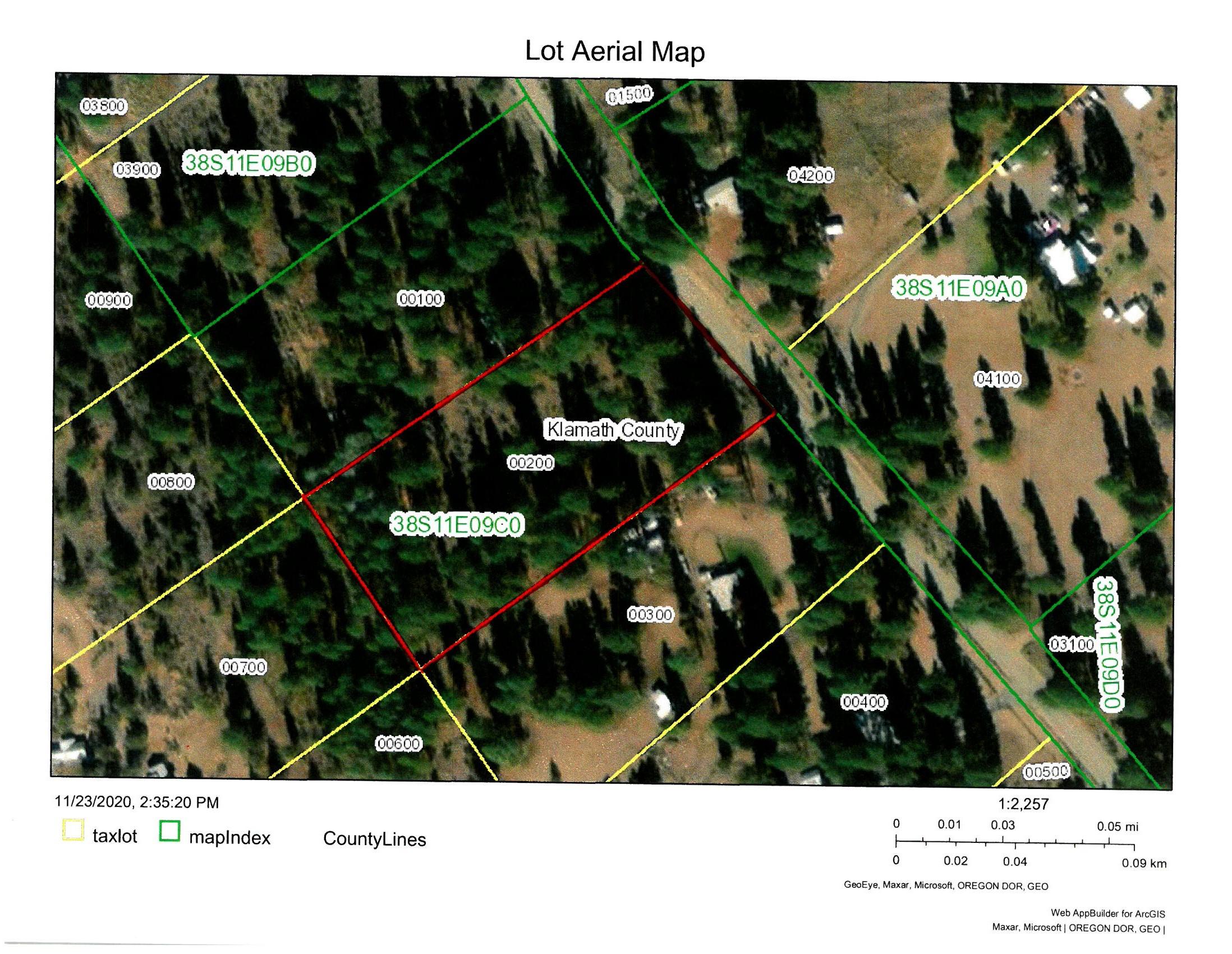 Beautiful lot on one of the best maintained gravel roads in Klamath Falls Forest Estates with power at the road too! This is a beautifully treed lot!  The lot is sloped, but not too steep until you reach the back.  There are several good building sites.  Stick-built or manufactured are both o.k.  This is a very nice area and paved roads are not far either way you go (Highway 140 or Bly Mountain Cutoff Road).  Area of good wells and septic systems too!  This is a cash sale only.