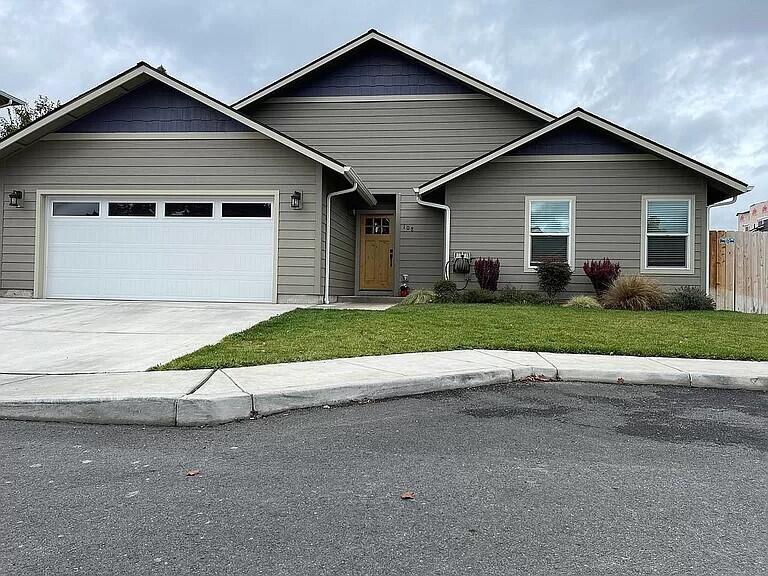 Newly built in 2019, this beautiful 3 bedroom 2 bath home is located on a private street in a quiet neighborhood. 
Enter into the open great room with vaulted ceilings and Hickory hardwood floors. The Kitchen features beautiful Knotty Alder cabinets, Granite countertops and Black Stainless Steal appliances including a gas stove. The split bedroom floor plan is perfect for families. The bedrooms have walk-in closets with ample storage and spacious bathrooms. With a lovely backyard and fire pit area, enjoy s'mores on a cool evening under the lights. 
Make this your new home and enjoy being minutes away from downtown, parks, schools and the beautiful Rogue river.