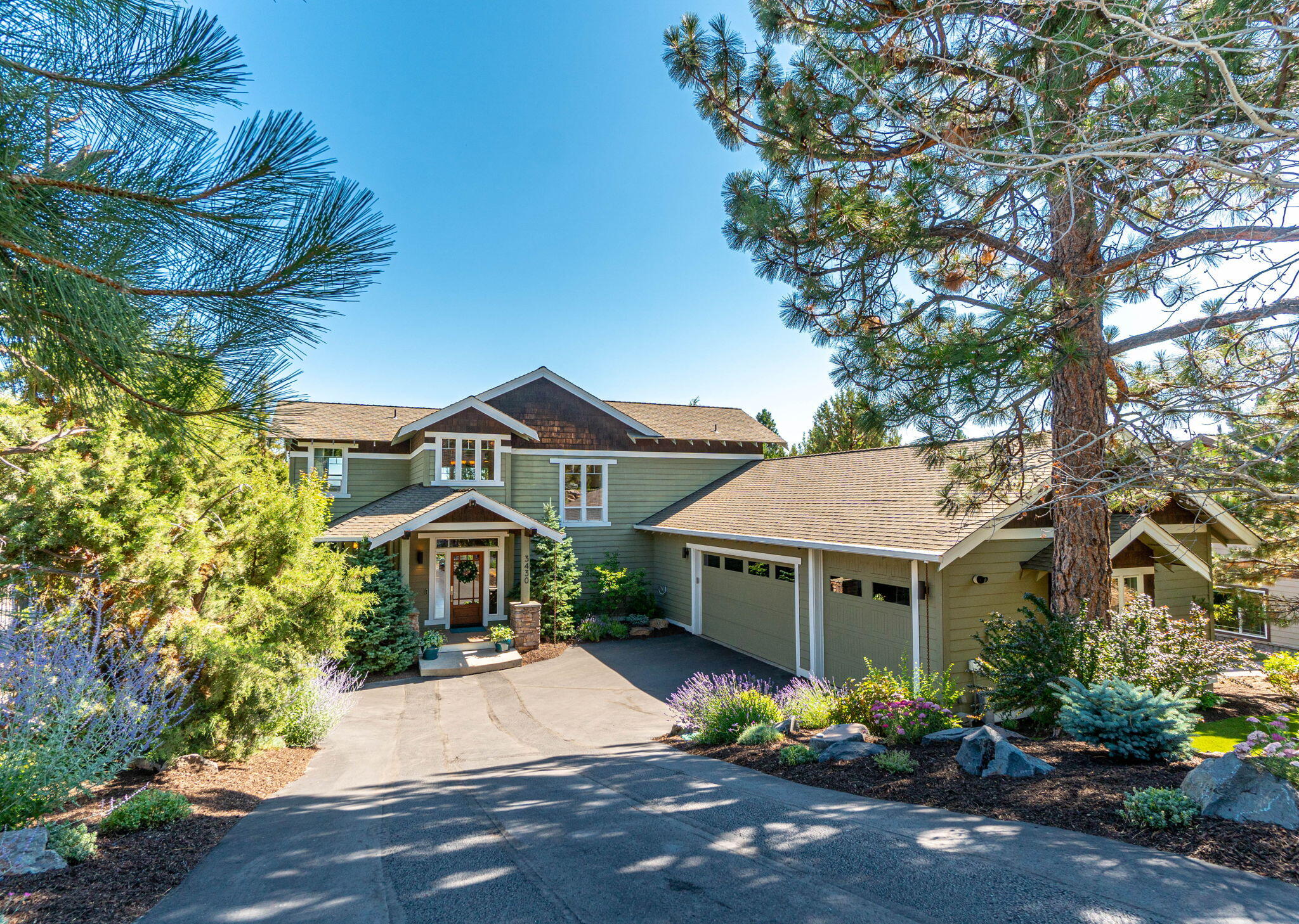 Timeless craftsman built by Ridgeline Custom Homes in the heart of coveted Awbrey Park. This home feels grand with its 2 story entry and living room but cozy with its layout and footprint. With the primary bedroom on the main level & 2 additional bedrooms, a bathroom & bonus space upstairs this custom home provides great separation of space and livability. The deck leads to a totally reimagined backyard complete with a hot tub and entertainment area. You won't want to miss the extra storage space below the sprawling deck that could easily be transformed into an office or additional room. The new low maintenance landscaping continues to the front of the home creating a stunning and welcoming curb appeal. To top it all off, the 3 car garage, with a heated driveway approach, has RV storage which is perfect for all your Central Oregon recreational needs. You won't want to miss this home conveniently located to Mt. Washington, the River Trail and all the westside of Bend has to offer!