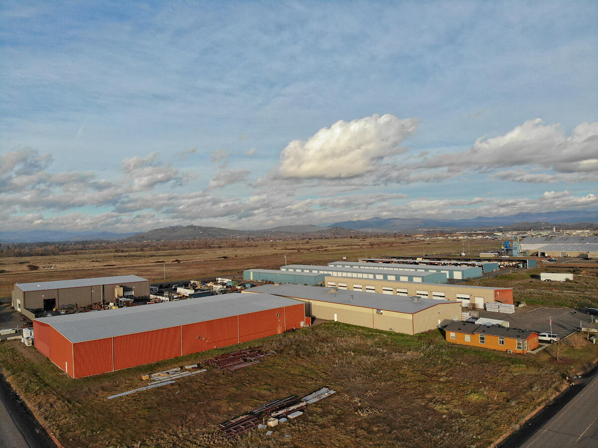 Amazing and very rare opportunity to own 56,362 Sqft of commercial buildings on 3.57 Acres! The possibilities are endless with General Industrial zoning including 3 buildings and a main office. Building A has 20,000 Sq Ft with 14-Foot Bay doors 3 phase power and fire sprinklers in place. Building B has 11,250 Sqft and 9 14' loading doors and 3 phase power. Building C has 23,546 Sqft 2 16'' loading doors and 3 phase power also including fire sprinklers. The very clean office has 1566 Sqft and has offices, kitchen, 1.5 baths, Tub/Shower combo and a bedroom. There are 5 power meters leaving the option to accommodate many renters for building B. Very large parking area and 2 entrances will accommodate easy access for any size vehicles and more than enough parking. Do not miss your opportunity to take advantage of this investment or business opportunity. Possible owner carry with 50% down.