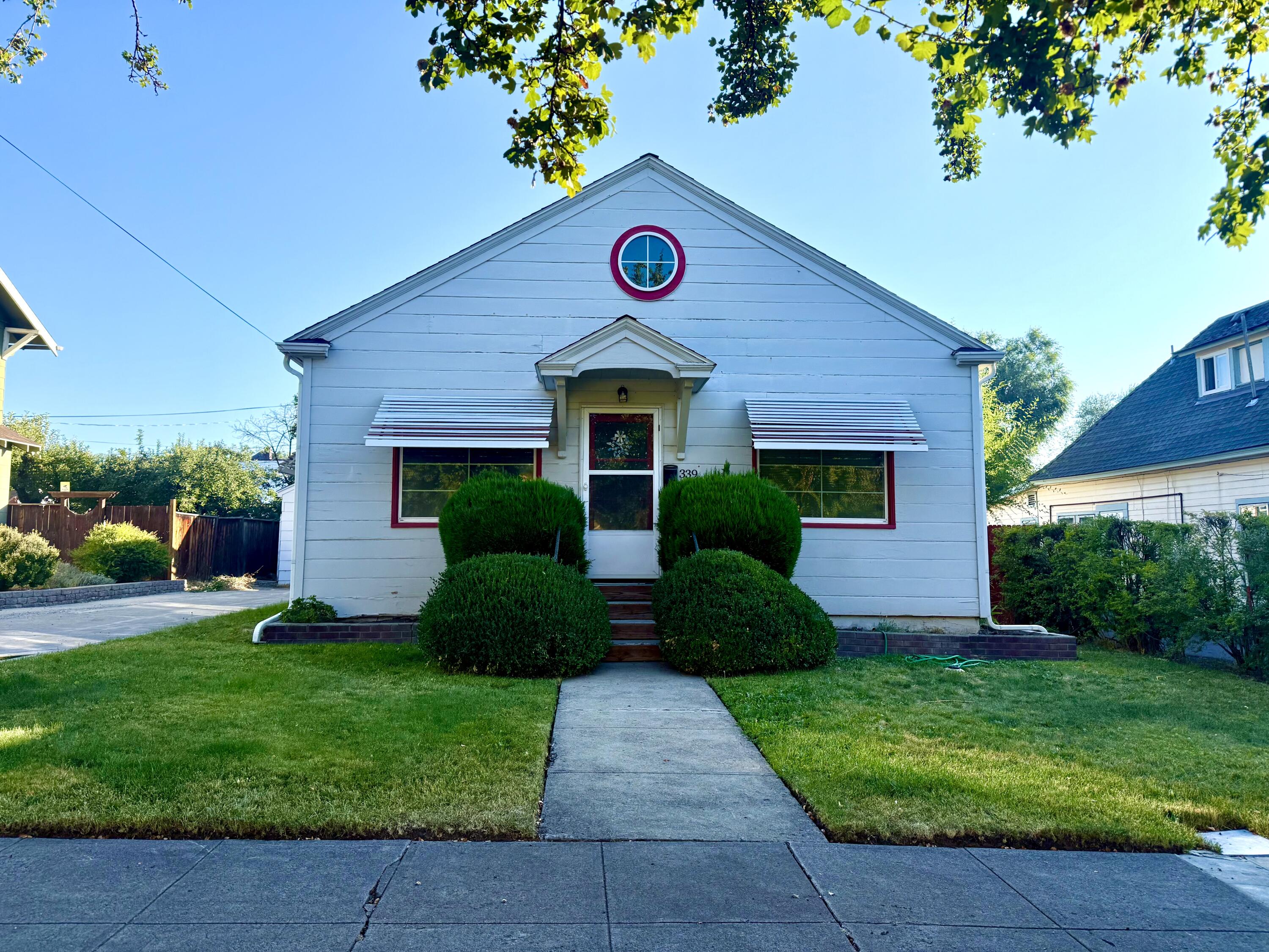 Cute as can be! Very well kept with Great Curb Appeal! This is a great home for a first time homebuyer or someone looking for a 2 bedroom home! There is an additional
bedroom and 1/2 bath for your overnight guests! Nice landscaping in both the front and back yards. This home also features, Updated Vinyl Windows, Updated electrical,
built-ins as well as a large basement!