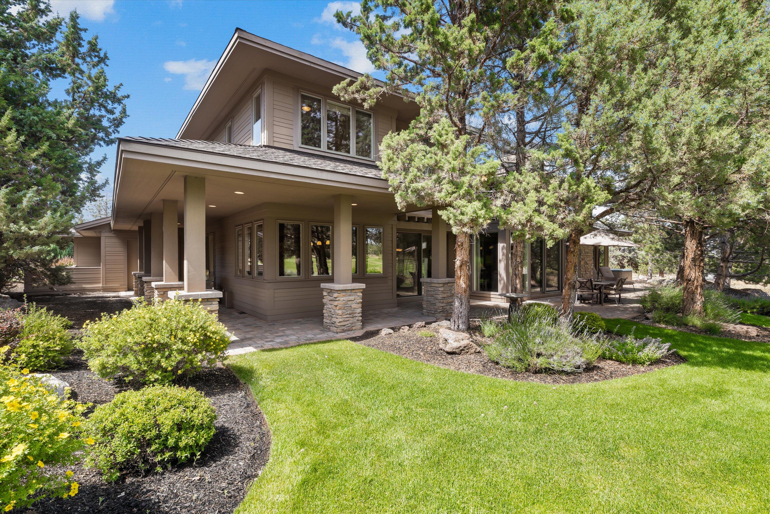 Timeless Floor Plan Custom Designed by Neal Huston w/ views of The Ridge Golf Course #4 & #5 Fairways & #4 Greens. This 1 owner, never rented home boasts a 3,783/SF Living Space on .54 Acres, 3 Bed, 2.5 Bath w/ Primary Suite on main level featuring a Gas Fireplace, Walk-in Tiled Shower along w/ a separate Soaking Tub off of a Generously sized Dual Walk-in Closet & access to the outdoor HotTub which is tucked away in the Spacious Yard. The Living Area has ample light from the large windows facing a lovely setting of the golf course.The Kitchen has a breakfast island featuring a 36'' Dacor Cooktop w/ KitchenAid Appliances & walk-in pantry for all storage needs. Perfect balance between work & play w/ a separate office & bonus room on main level & 2nd bonus room w/ kitchenette on 2nd level. The outdoor corridors feature a 7-zoned Irrig.System, covered paved patios w/ cedar eves,1,137/SF-4 Car Garage, wired w/ 220 in shop area. Just minutes from activities on or off The Ridge at Eagle Cres