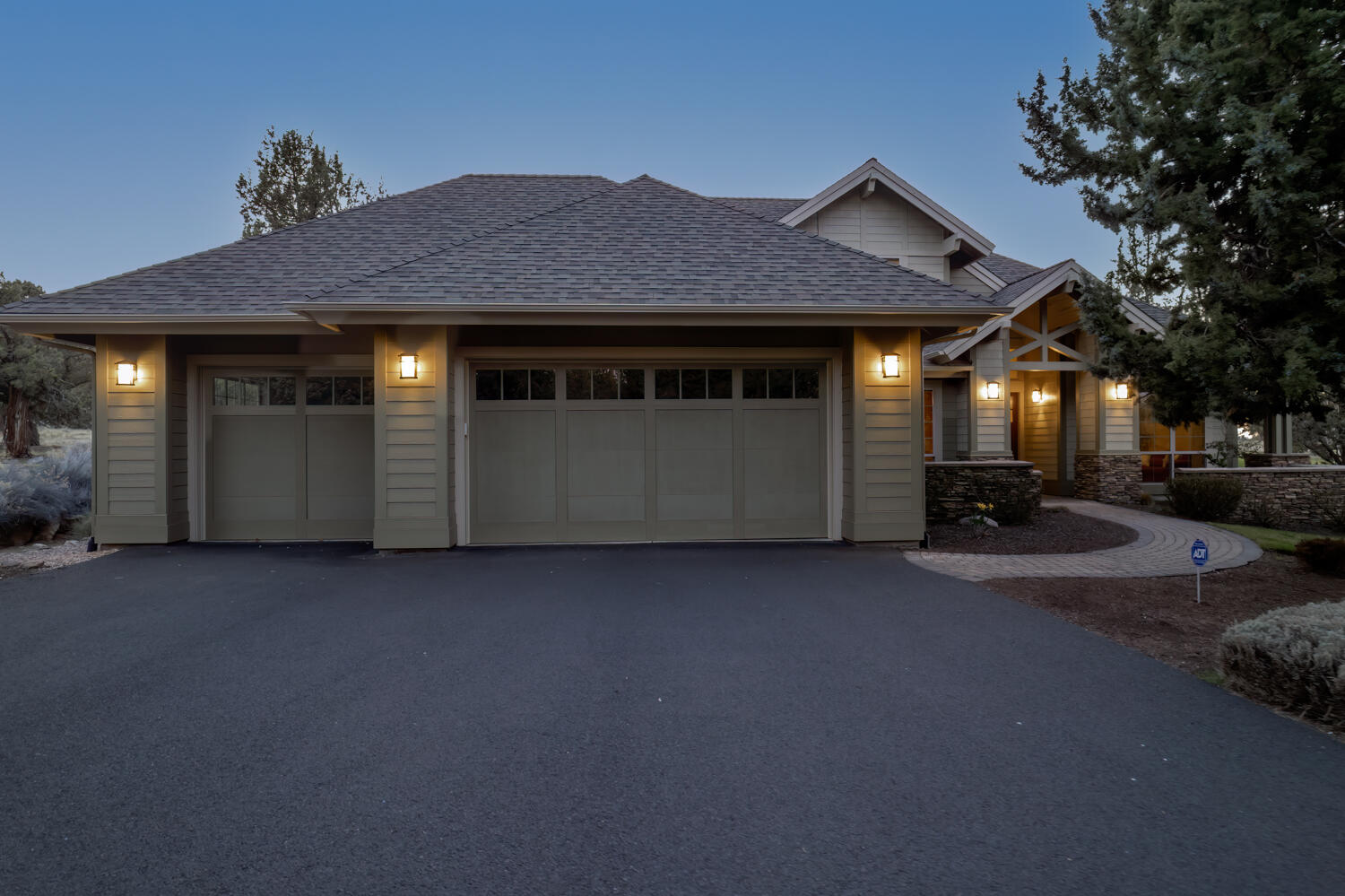 This gorgeous home is located on one of the largest golf course lots in Eagle Crest Resort overlooking the 4th tee box of The Ridge Course! Built by award-winning builder Sage Builders, this thoughtful floorplan features a great room with the primary suite, den, laundry/mud room, formal dining area, gourmet kitchen with an expansive breakfast bar and dining nook, and half bath on the main level. Two additional guest rooms; one with a full bath en suite, a third full bath, and a spacious bonus room/4th bedroom on the upper level. Spacious open rooms with soaring ceilings, walls of windows, alder cabinetry, and high-end finishes throughout. Expansive paver patio for enjoying the beautiful Central Oregon weather. The driveway, extra parking pad, and triple-car garage offer abundant parking options. This home checks all the boxes for a primary residence, second home, or vacation retreat. Eagle Crest is home to three 18-hole golf courses, an 18-hole putting course, and miles of trails.