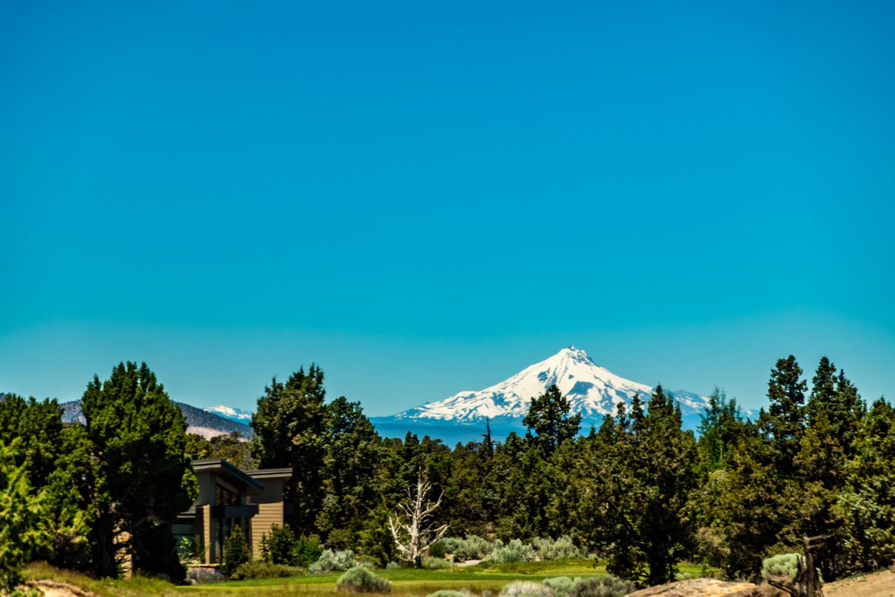New Exceptional Price! For this fabulous Homesite on Tom Fazio's 12th Hole! Seize the opportunity to build your dream home on one of the most spectacular homesites in Pronghorn. Spanning .95 acres, this premier west-facing lot offers breathtaking views of the Cascade Mountains & pristine fairways, creating an unrivaled backdrop for luxury living. Enjoy year-round golf on 2 Championship Courses—the Fazio and Nicklaus—while indulging in the world-class amenities of Juniper Preserve Resort: a Private Member's Club, Dining, Village Market, Pools, Day Spa & Fitness Center, Dog Park, Pickleball Courts, Hotel on site, Wellness Center, Scenic Bike Paths, Nature Trails, 24HR Staffed & Gated entrance, & more. All just a short drive into Bend and the Redmond Airport, making this an ideal retreat with convenience at your doorstep! Complete Survey & Geological topo map. Pronghorn Club Membership Included!