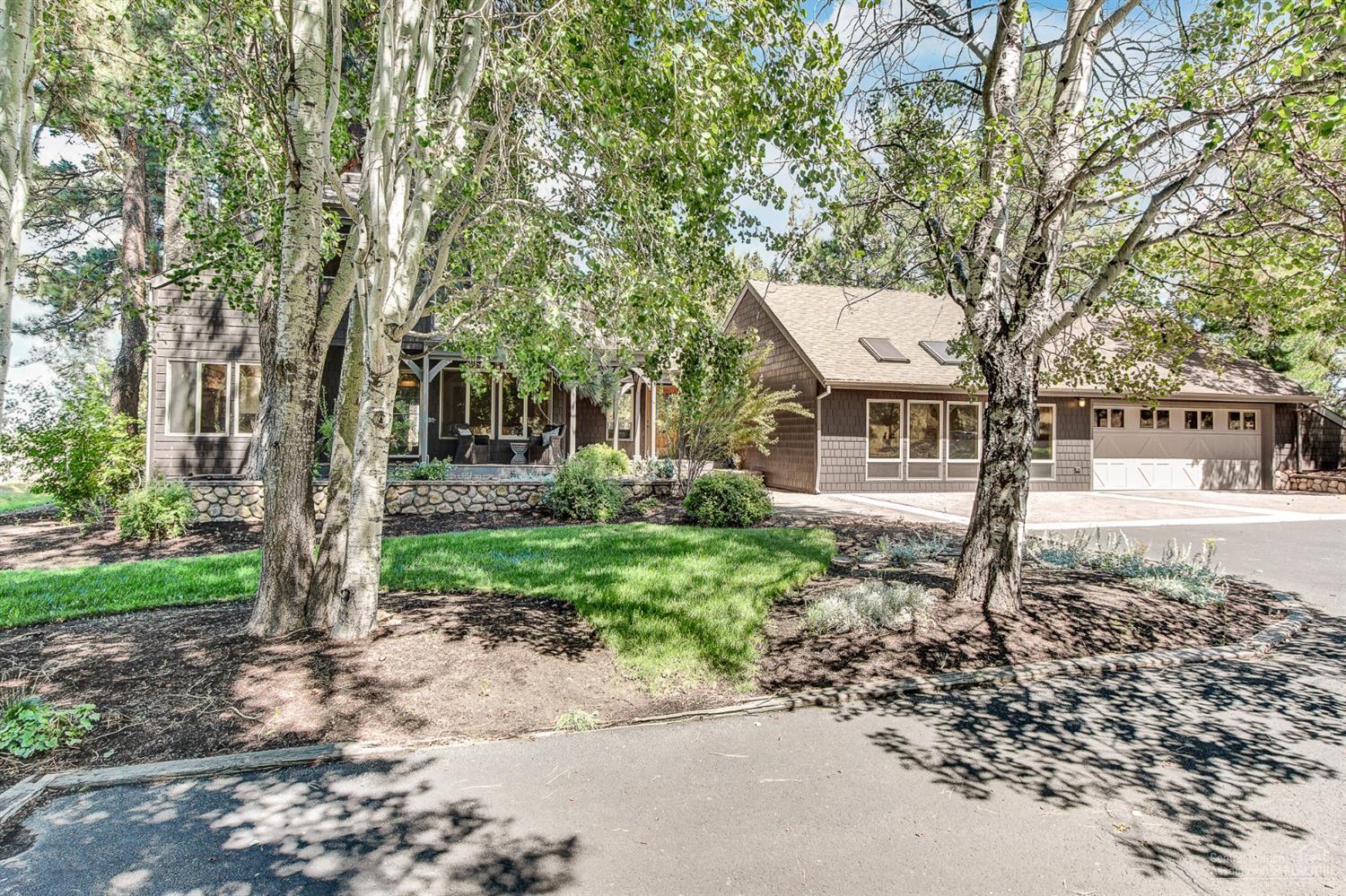 Luxury home in private setting. Timber frame construction, exposed beams and wood surfaces provide western charm. 2 story kitchen has commercial range with dual ovens, slab granite & brand new dual fridge and freezer. Family room leads to wrap around porches and amazing pool area. Wood burning fireplaces in LR and family room. Spacious, vaulted master is bathed in natural light and has a private balcony and charming bathroom with claw foot tub. 2 stall barn with tack room, heat and water. Paved driveway.