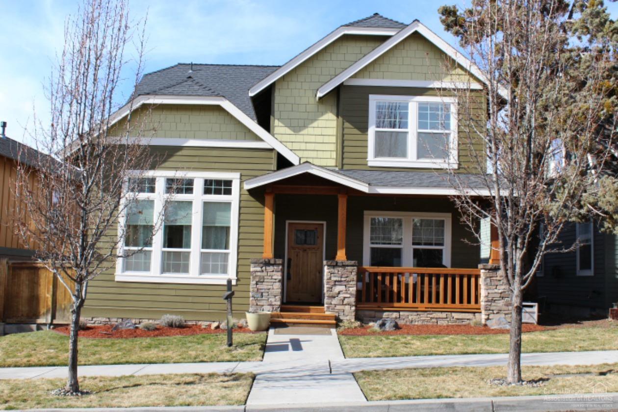 Ready to move in. The home was recently updated with a knotty alder front door, carpet upstairs and on the stairs, oil rubbed bronze fixtures, remodeled laundry room, upgraded laminate flooring, painted inside and out. Jan 2017 new hot water tank installed. Front porch and pillars redone. Freshly landscaped.