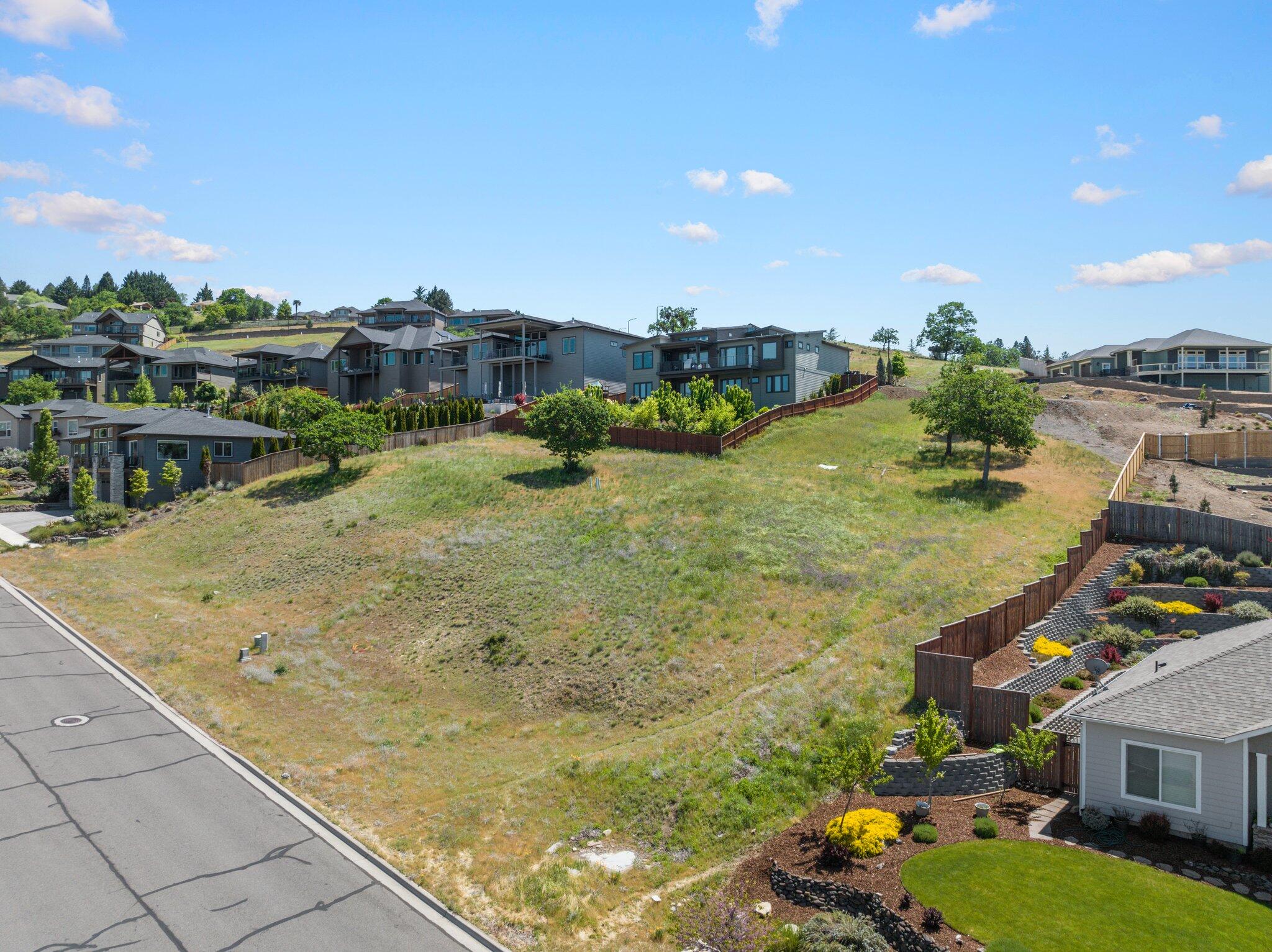 BEST value on one of the last lots in the Vista Pointe Development!  Don't miss this opportunity to build your dream home! This .26-acre lot is perfectly situated within an established neighborhood  surrounded by newer homes, with a community park just down the road. Enjoy beautiful valley views and the nearby Roxy Ann Peak's hiking trails.  Minutes to various wineries, restaurants and medical care.  Great school districts.  4465 Vista Pointe is also for sale.
