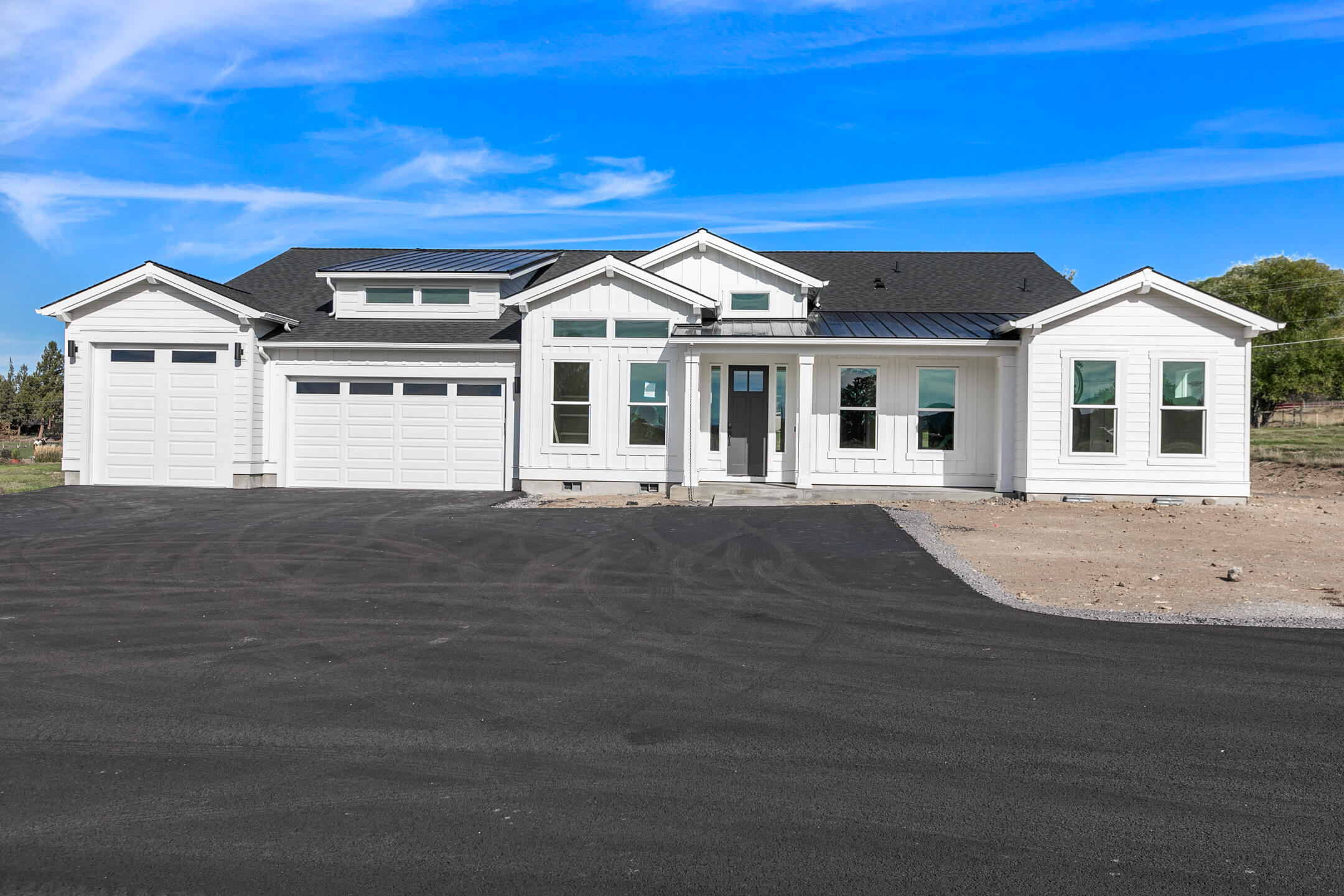 Beyond all expectations! This stunning one level just under 3400 sq ft Pahlisch Select Custom Home on 2+ irrigated acres was just completed. Upon entering, prepare to be captivated by the expansive open concept with 12' ceilings, gorgeous locally built upgraded cabinets & entertainer's dream kitchen! Huge Island w/farmhouse sink and a spectacular pantry! Main suite w/dual sinks, soaking tub, tiled shower, ample storage and large walk-in closet. Opposite of the main suite is rec/flex room w/access to covered patio, 1/2 bath, 2 bedrooms with Jack/Jill bath, & a full guest suite. All the hard work, decision making and tedious waiting has been done! Very peaceful setting w/Cascade Mountain views, lush green fields and your own pond surround you. Irrigated ground has underground automatic sprinklers for ease of maintenance. Power and sewer are upgraded and ready for your dream shop w/ADU to be added if you desire. All of this within just minutes to town!