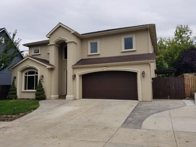 Stunning Stucco Custom Built Home. The Exterior Architecture and the Interior Floor Plan are are full of detail. When you enter the home you will fall in love with. Lots of natural light, travertine floors, and gorgeous wood floors. This Kitchen is Phenomenal with all Custom Cabinets, jenn air (Gas Range), Incredible Granite. Large island. Lots of storage. Living room, family room, dining room, coffered ceiling, inset lighting, breathtaking gas fireplace custom mantle. The Master Bedroom has his and hers walk in closets and a huge custom bathroom. The Master bath has a shower you will Love. Covered patio and upstairs has an additional covered patio. This home is 4 Bedrooms. Vacant and ready to move in. Lots of upgraded lighting. To much to mention