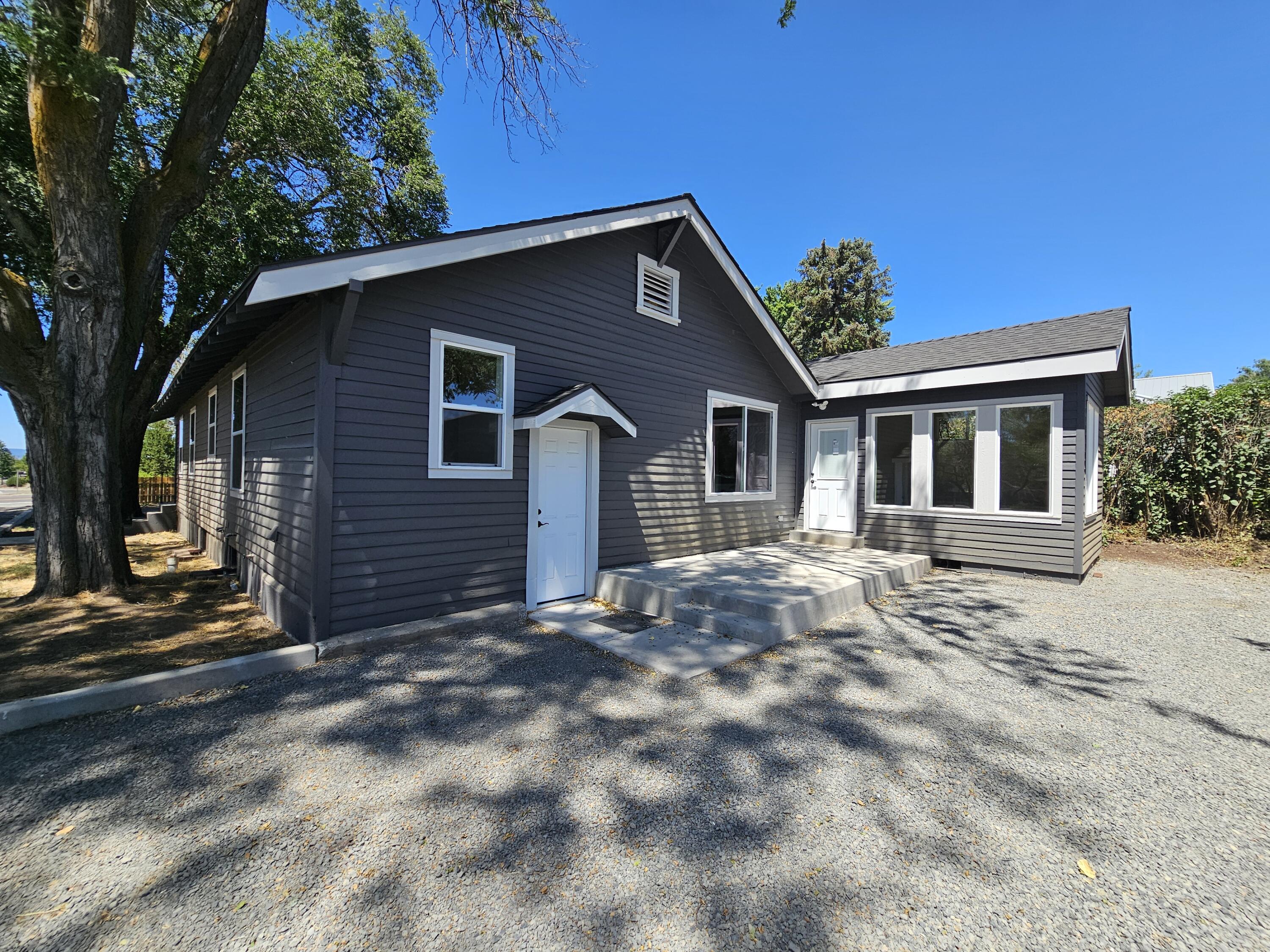 Charming 2,010 sq. ft. home with 3 bedrooms and 2 baths, situated on 0.48 acres. This home has been completely updated! It features LVP flooring throughout, all-new appliances and cabinetry in the kitchen, new vanities in the bathrooms, Corian countertops, a tiled shower, a shower/tub insert, a shiplap fireplace with an electric insert, new windows, insulation, a new furnace, and AC. Additionally, a brand-new well was drilled in 2024, a new composition roof has been installed, and both the interior and exterior have been freshly painted. LED lighting is featured throughout, along with new concrete work, a new wood fence, and ample space for RV or boat parking. Don't miss out on this beautifully renovated home. Listing agent is related to one of the sellers.