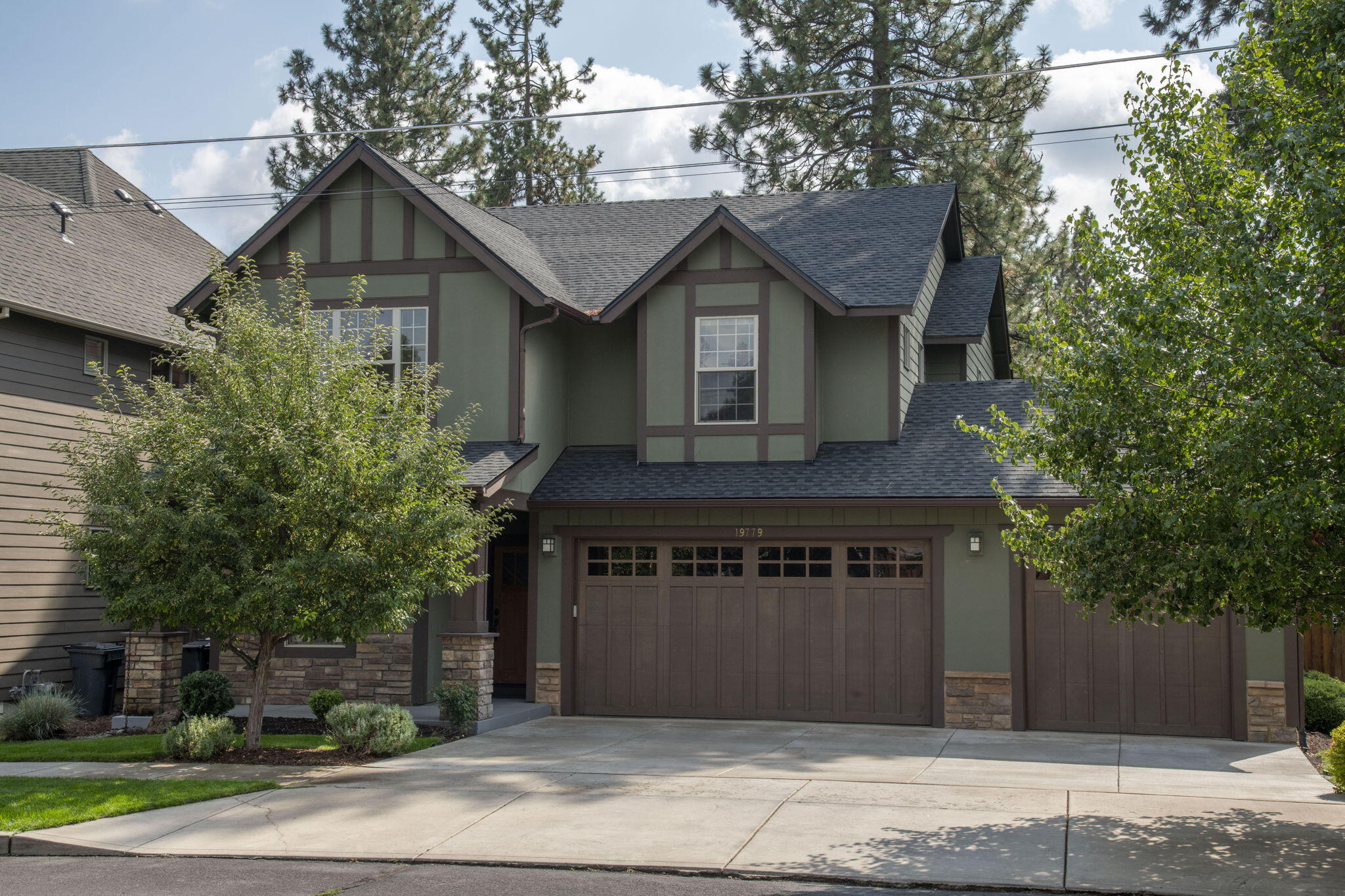 Prime SW Bend Home Near Old Mill with Spacious Living & ADU Potential: Lovely 4‑Bed + Office & Large Yard, ideally located just minutes from the best shopping, dining, and entertainment options. The inviting floor plan includes recent updates such as new hardwood floors, new roof, water heater, and concrete driveway. Additional features include a roomy 3‑car garage, AC, and built‑in speakers on the main level and back patio. The expansive fenced backyard with irrigation, paver patio and fire pit, perfect indoor/outdoor living — all with No HOA!