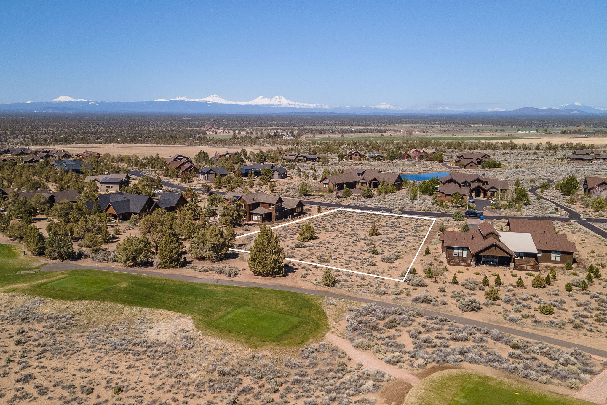 Build your vision at Brasada Ranch! This exceptional 0.64-acre lot sits directly on the golf course, offering stunning high desert scenery and a peaceful setting among beautiful, custom-built homes. A paved walkway provides easy access to resort amenities. Partial mountain views and the surrounding natural landscape make this an easy build opportunity. Experience Ranch Life with all the benefits of membership, including an athletic center with three pools, a bonus adult-only pool, spa, equestrian center, restaurants, hiking, biking, fishing and much more.