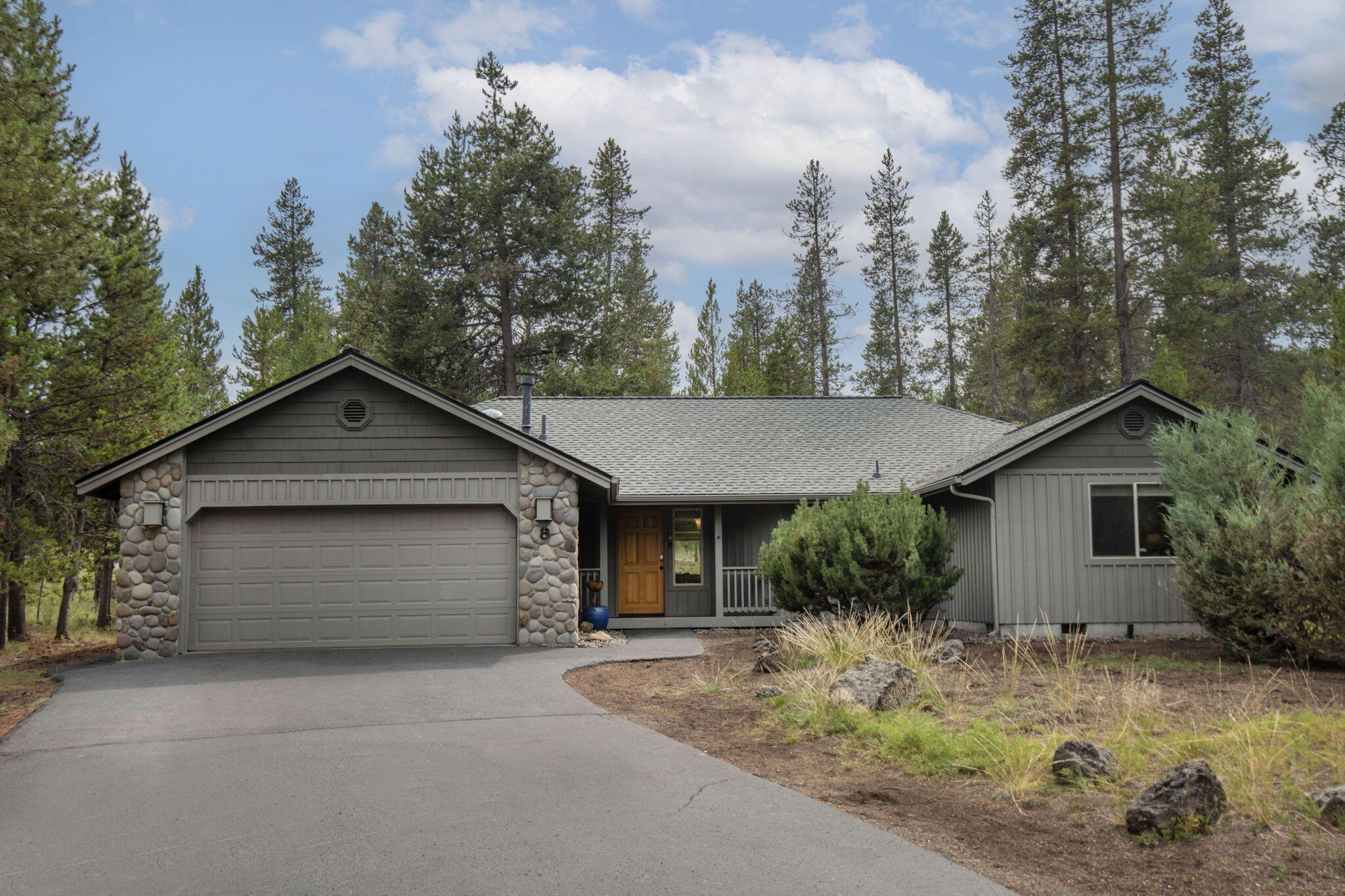 Beautiful Single-Level Sunriver Retreat Near Fort Rock Park! Welcome to this spacious and well-maintained 4-bedroom, 3-bath home tucked away on a quiet lane in the heart of Sunriver. Featuring a vaulted great room with warm wood ceilings and a cozy gas fireplace, this home offers the perfect blend of comfort and Northwest charm. The thoughtfully designed layout includes two primary suites, ideal for hosting guests or multigenerational living. The kitchen boasts hardwood floors, granite countertops, and stainless steel appliances—perfect for everyday living and entertaining alike. Step outside to a large deck with a private hot tub, ideal for soaking under the stars after a day of outdoor adventures. Additional highlights include a newer roof, hot water heater, HVAC, and AC. Located just moments from Fort Rock Park, you'll enjoy easy access to tennis courts, pickleball, a playground, and all the recreation Sunriver has to offer! Offered Furnished!