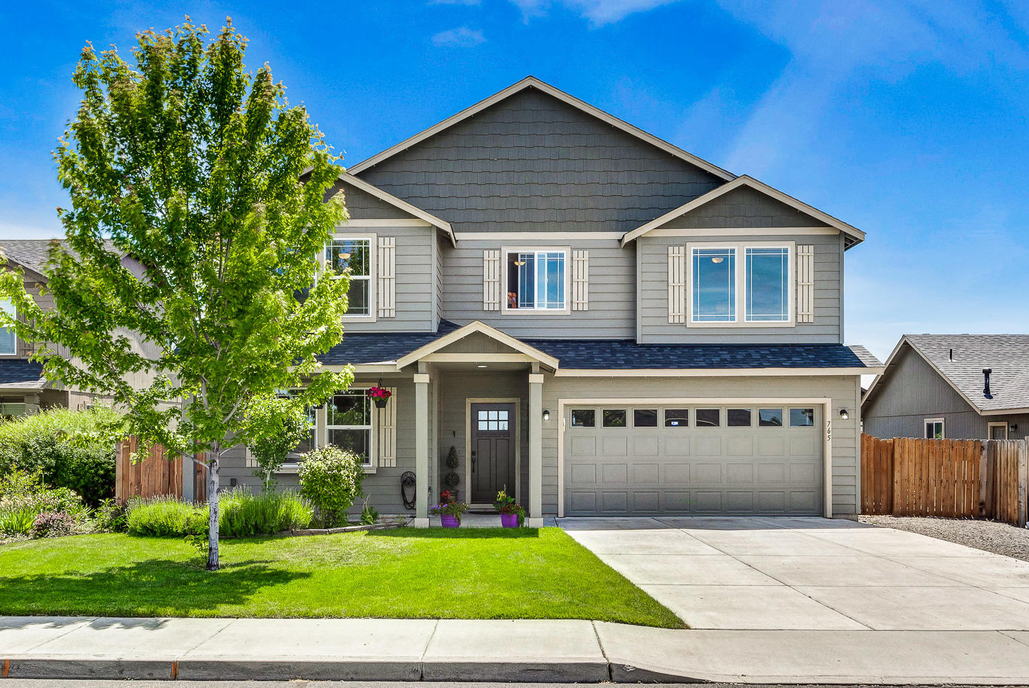 This spacious 3,200 sq. ft 5 bedroom home with many upgrades is waiting for you and your family! Home features large master suite with soaking tub, open kitchen with tile counter tops, large family room w/ gas fireplace, formal dining area, Central AC, dual climate control heating/cooling, insulated garage, peek-a-boo mountain views from upstairs, and a bonus room. 5th bedroom can be used as an office.   Outside boasts a large back yard, covered back patio, fully fenced dog run, RV Parking and so much more! Centrally located, quiet neighborhood just minutes to parks and Dry Canyon hiking trails. See attached 3-D virtual tour to explore this home and property.
